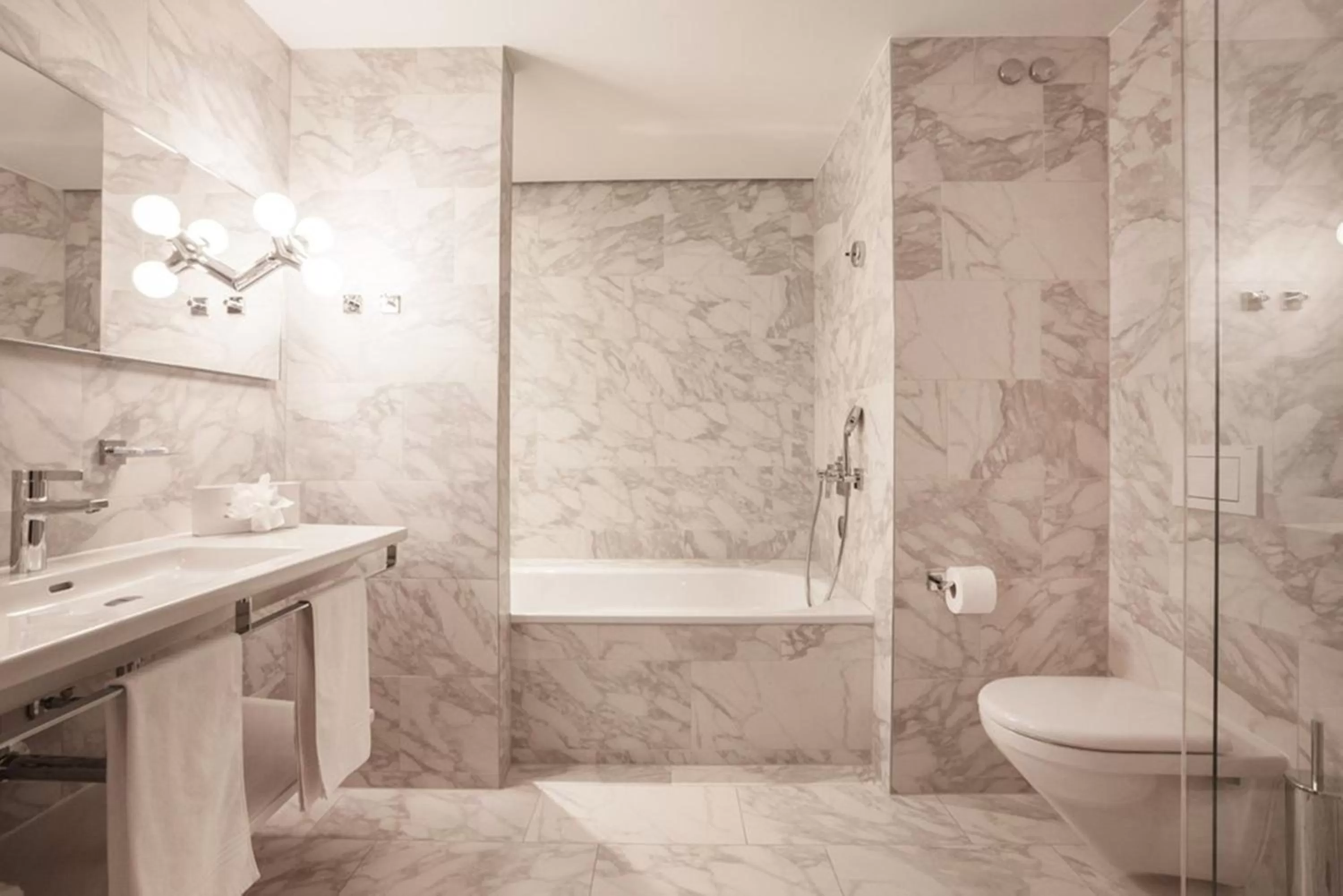 Shower in EMA House Hotel Suites