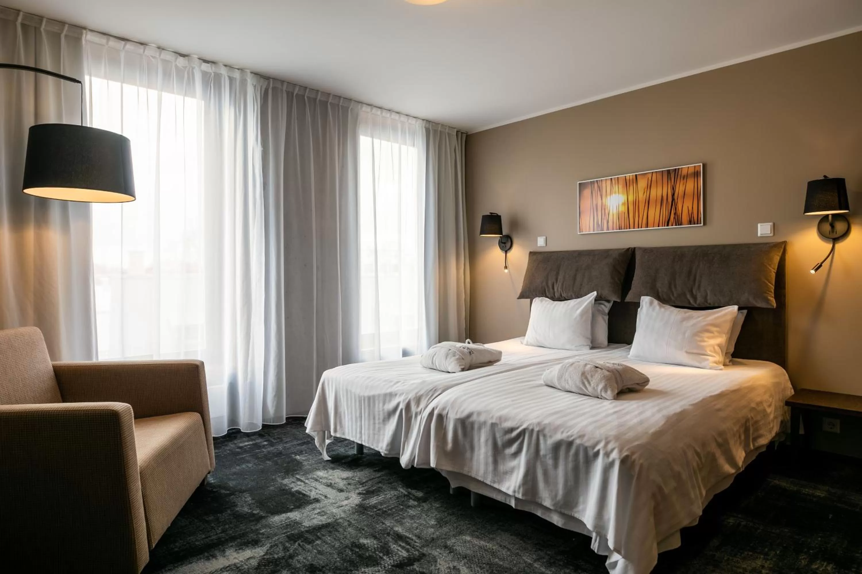 Bed in Johan Design & SPA Hotel