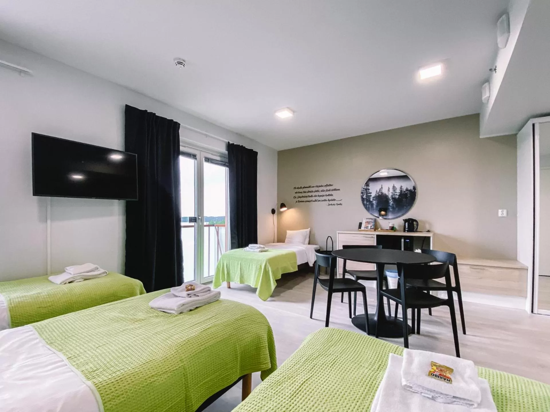 Bed in Hotelli Kuohu Kangasala - Hotel and Apartments by UHANDA