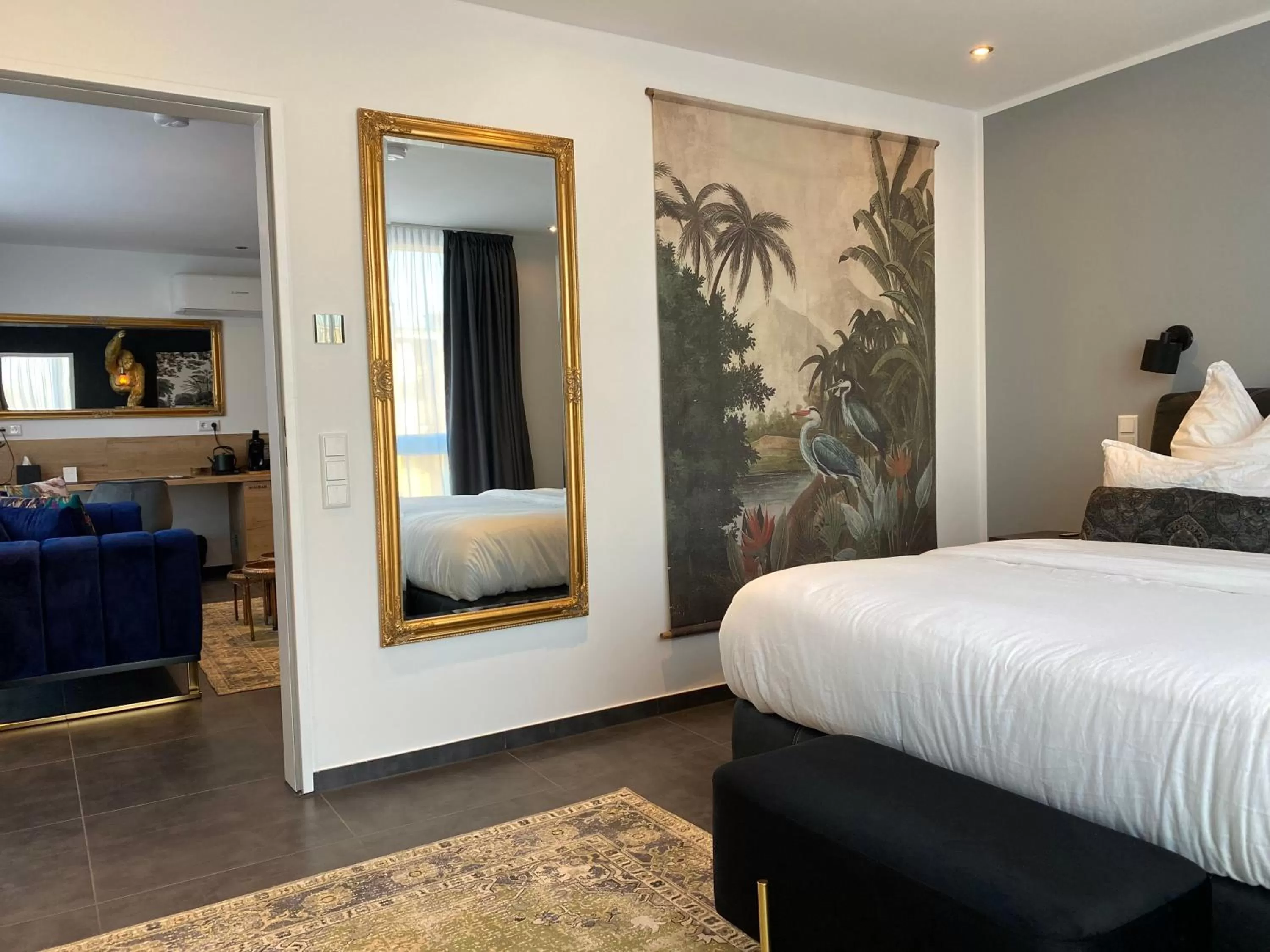 Bed in MARRAM Suitehotel