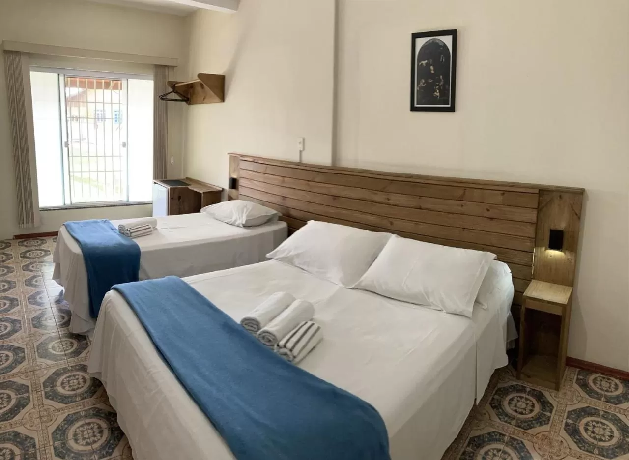 Bed in Pousada Marinamarela