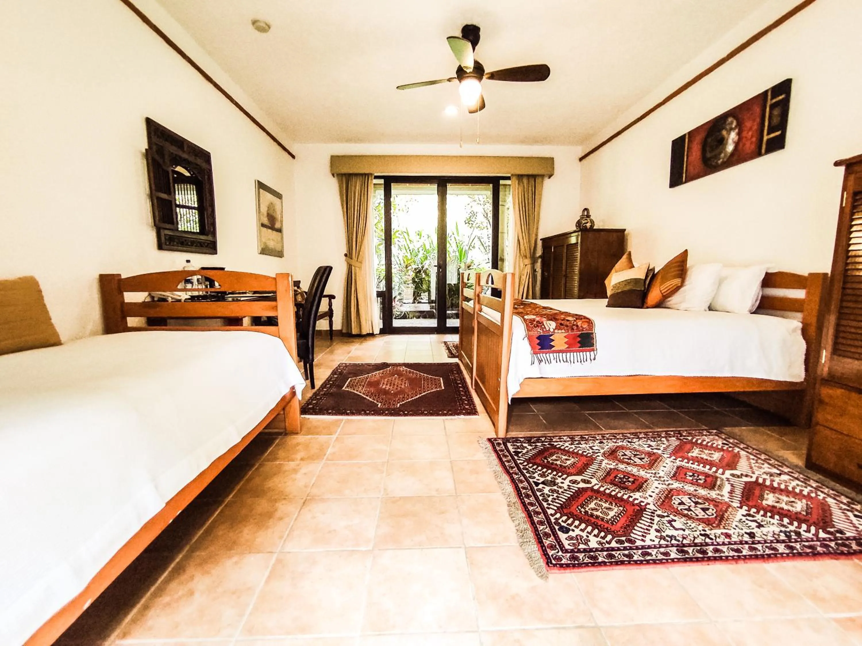 Bed in La Buena Vibra Wellness Resort & Spa