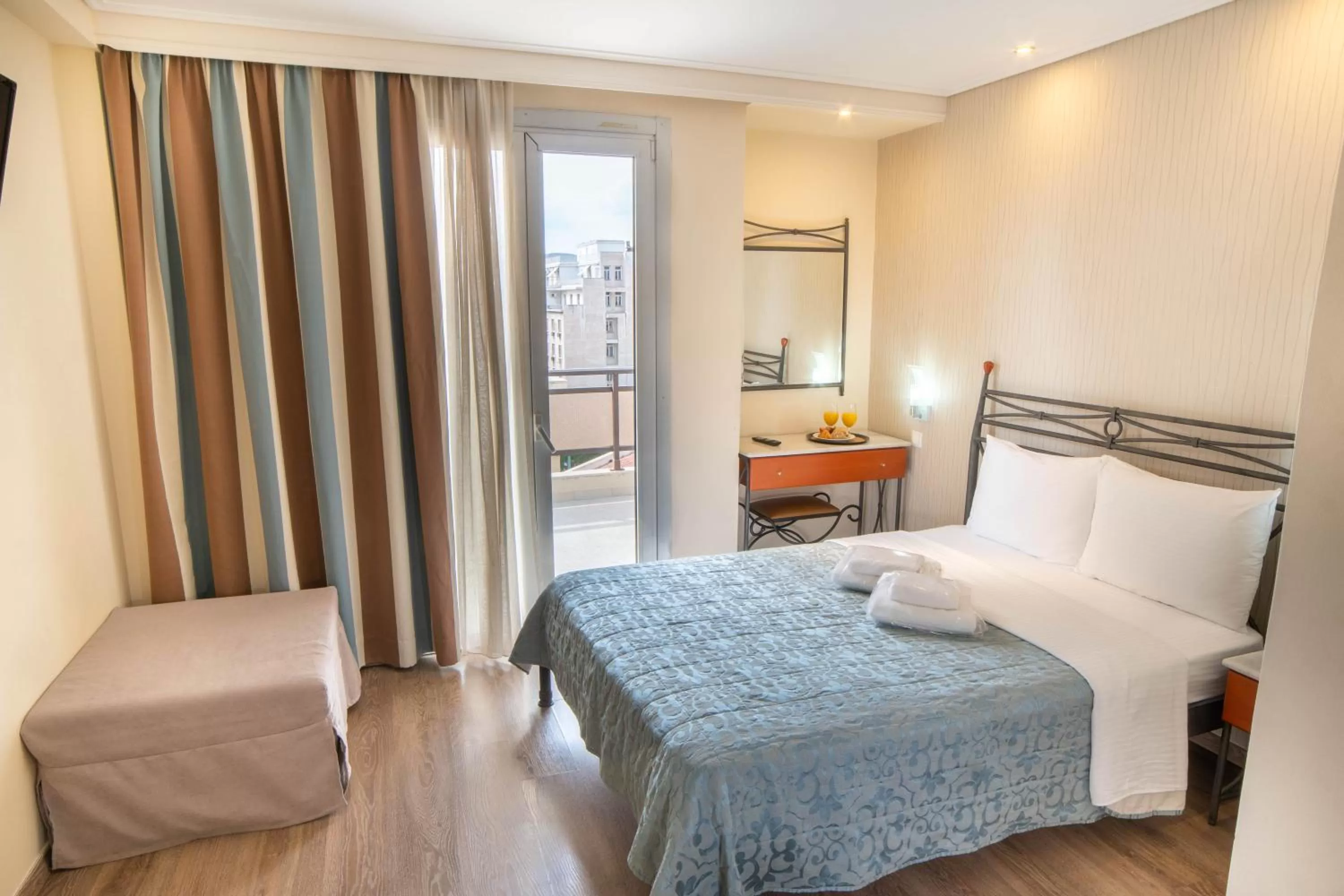 Bed in Argo Hotel Piraeus