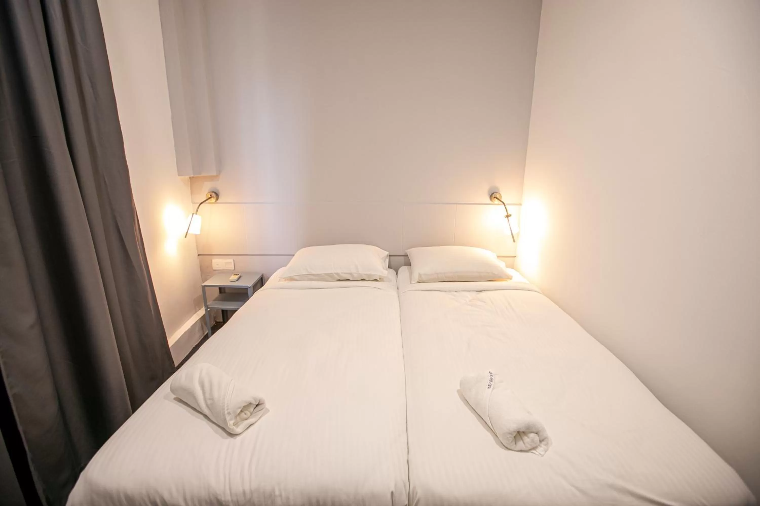 Bed in Grand Swiss Hotel