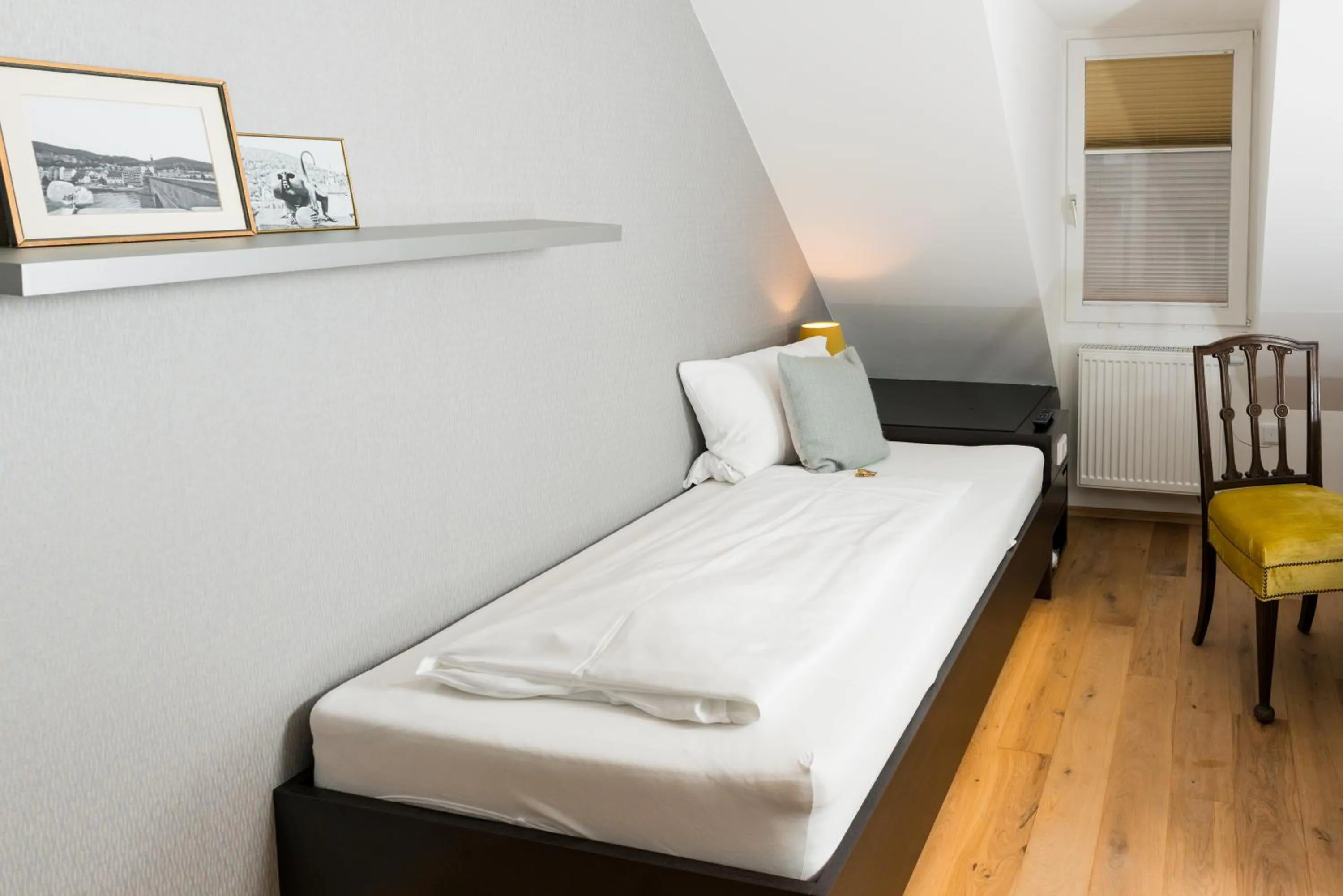 Photo of the whole room, Bed in The Heidelberg Exzellenz Hotel