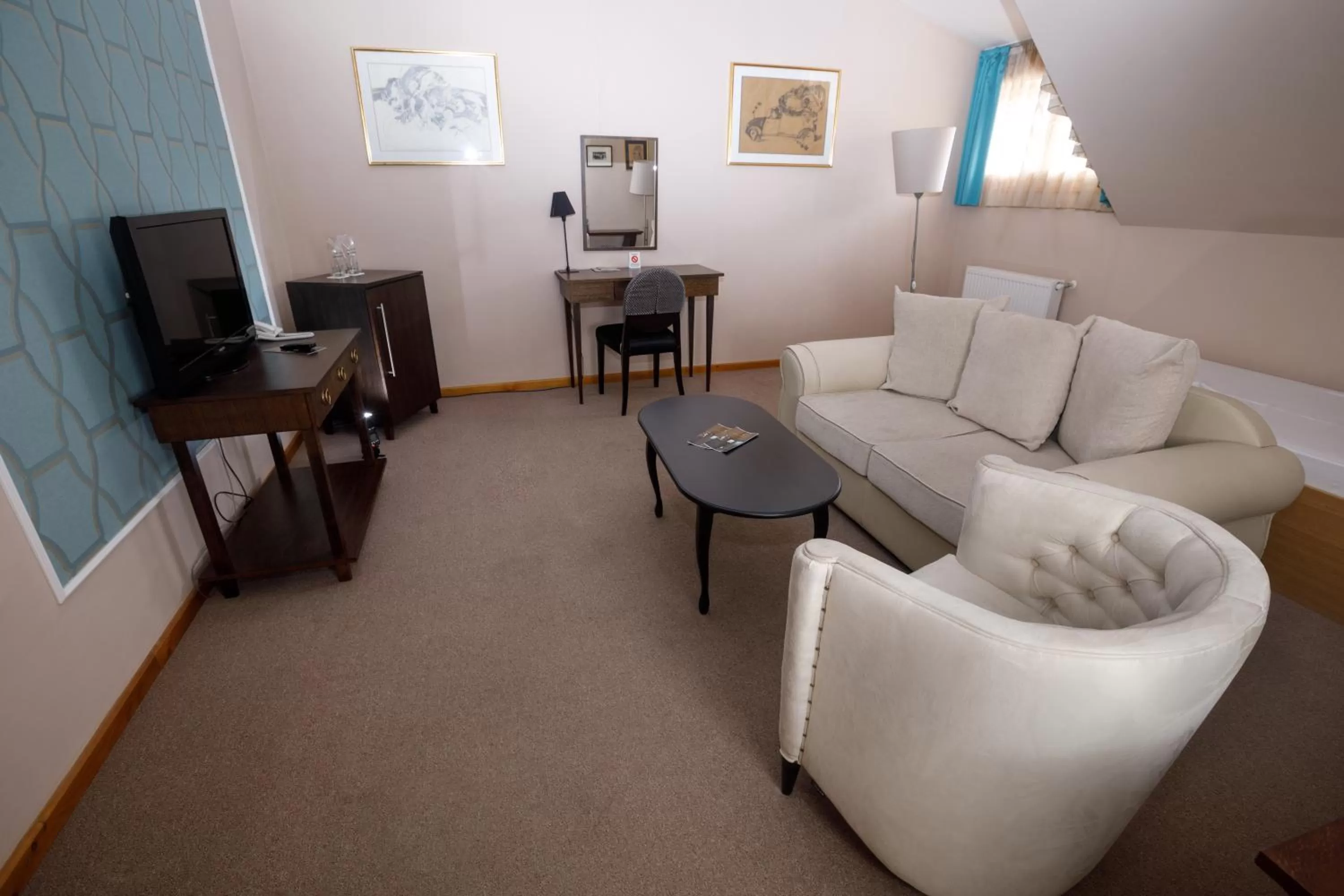 Living room in Art Garni Hotel