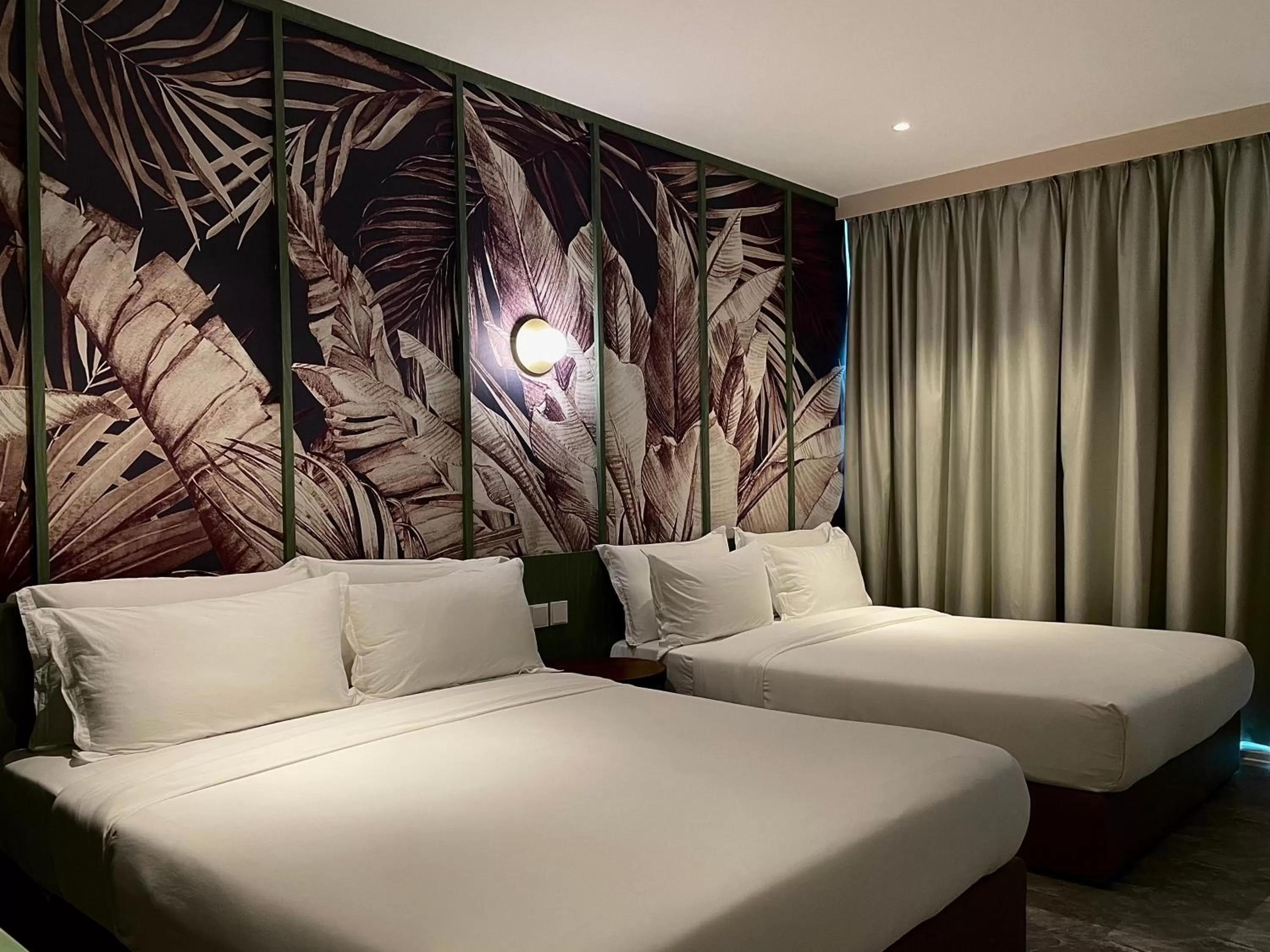Bed in Harper Boutique Hotel at Sutera Avenue
