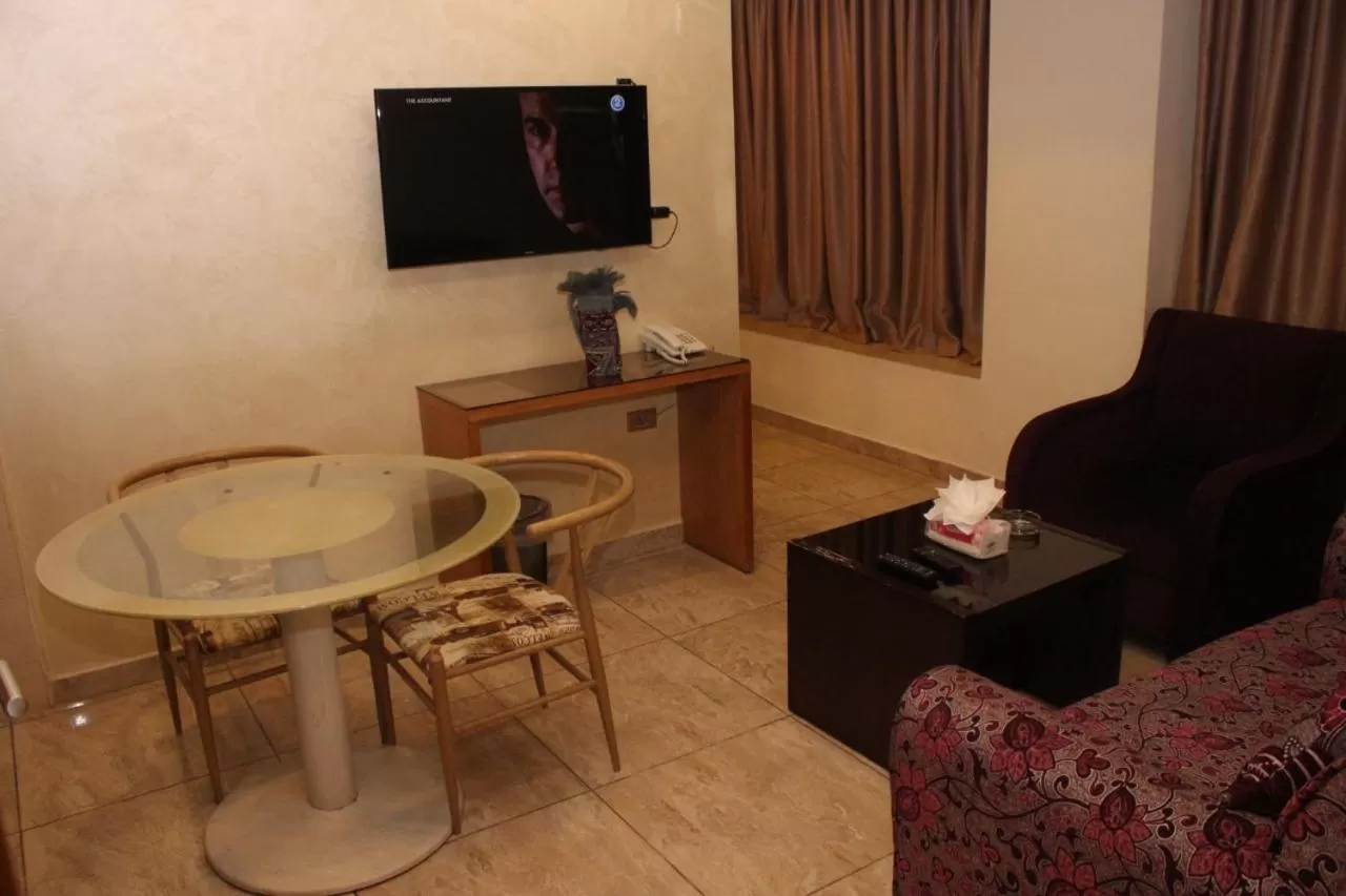 TV and multimedia, TV/Entertainment Center in Jawharet Alswefiah Hotel Suites