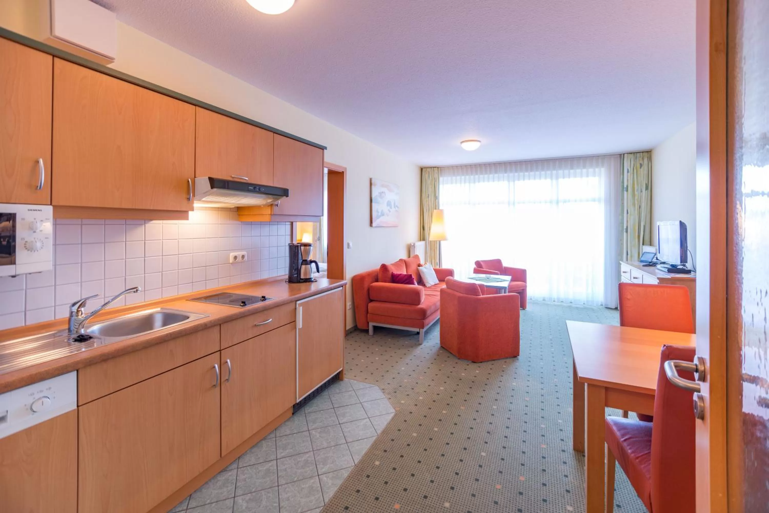 Photo of the whole room, Kitchen/Kitchenette in Am Weststrand Apartmenthaus Waldeck