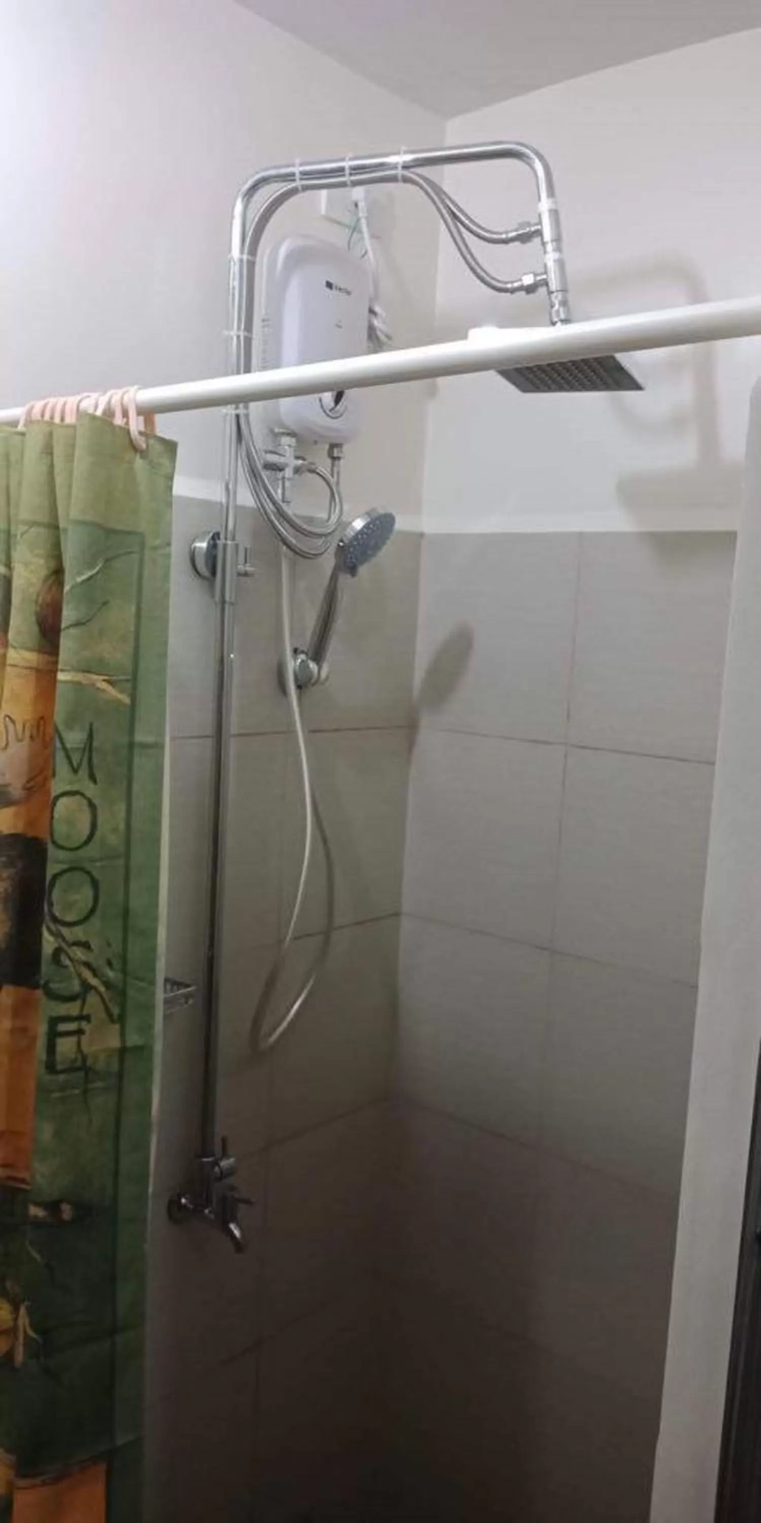 Shower in Green Residences Stays by PBYY