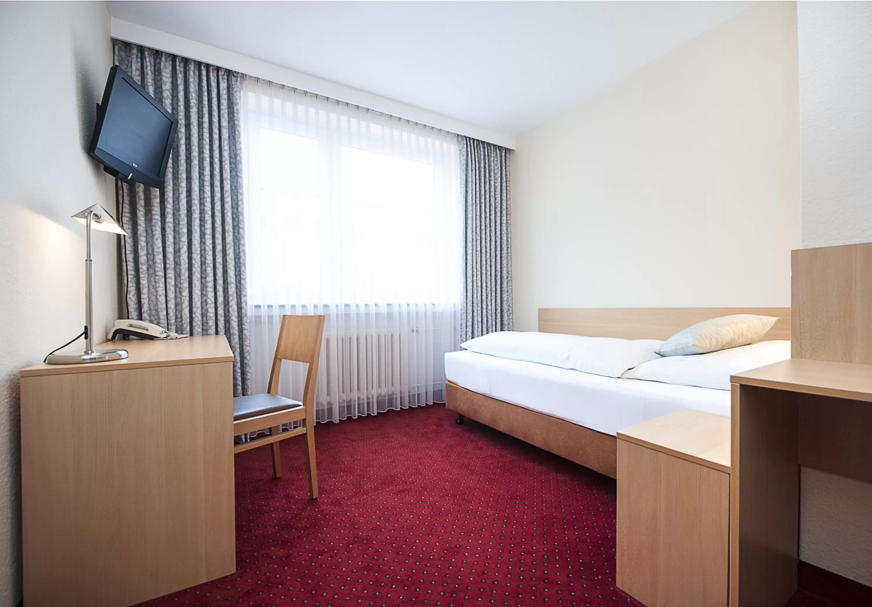 Photo of the whole room, Bed in Comfort Garni Stadtzentrum Hotel