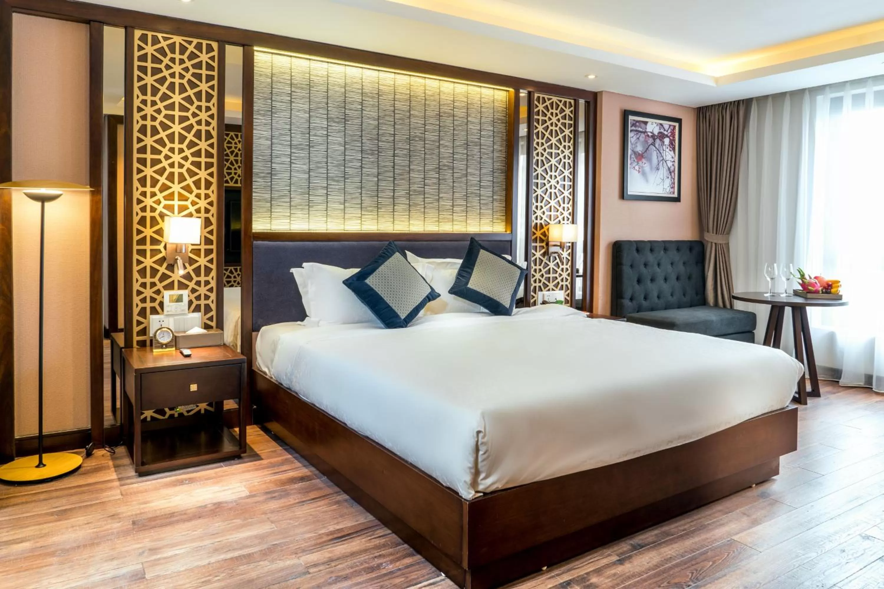 Bed in Conifer Grand Hotel