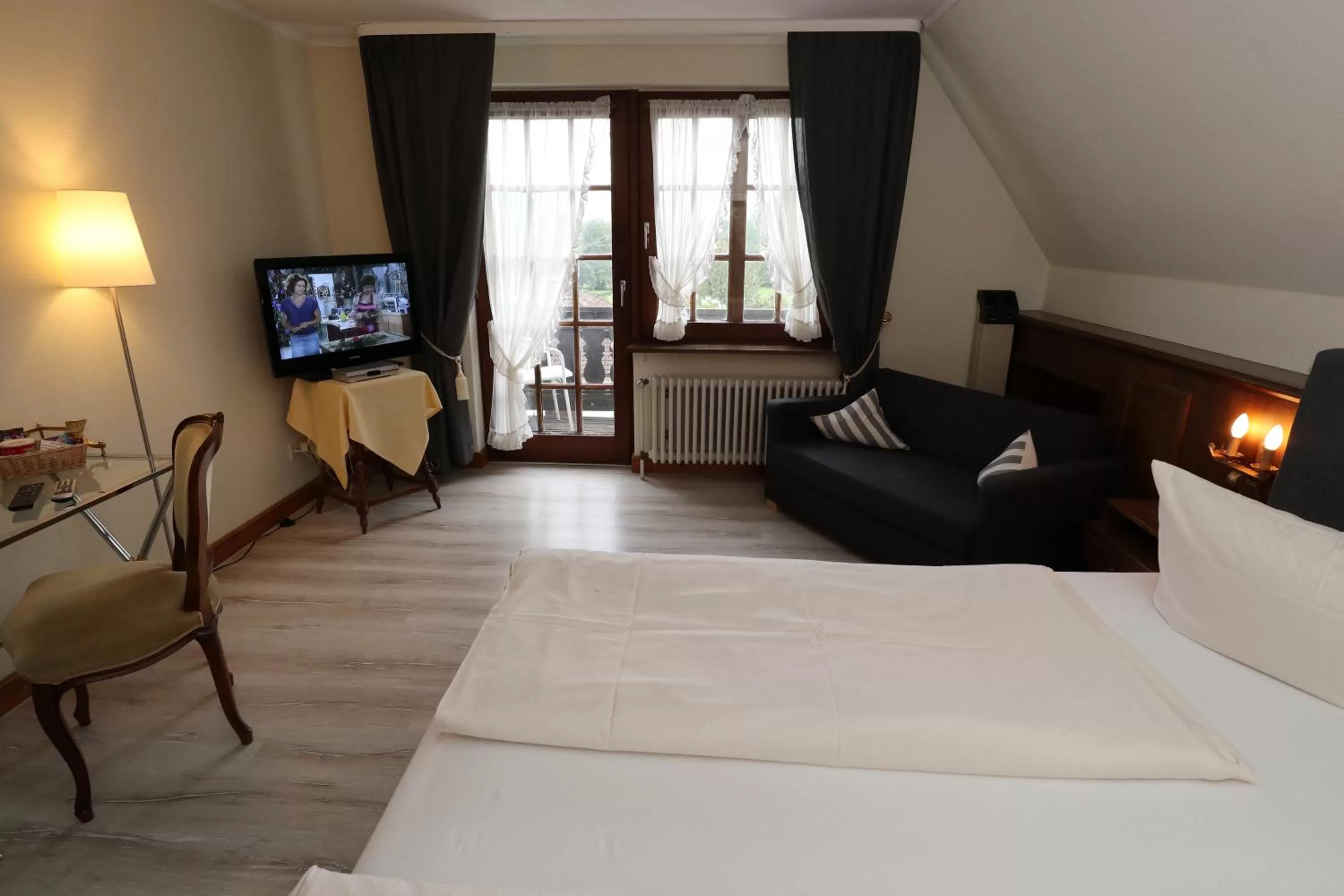 Photo of the whole room, Bed in Schwarzwaldhotel Stollen