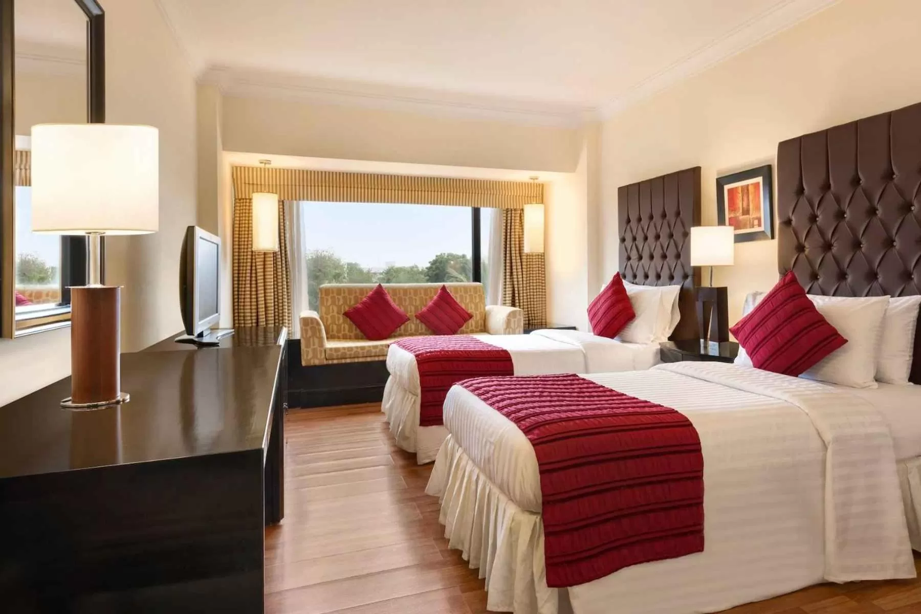 Bed in Ramada Plaza by Wyndham Karachi Airport Hotel