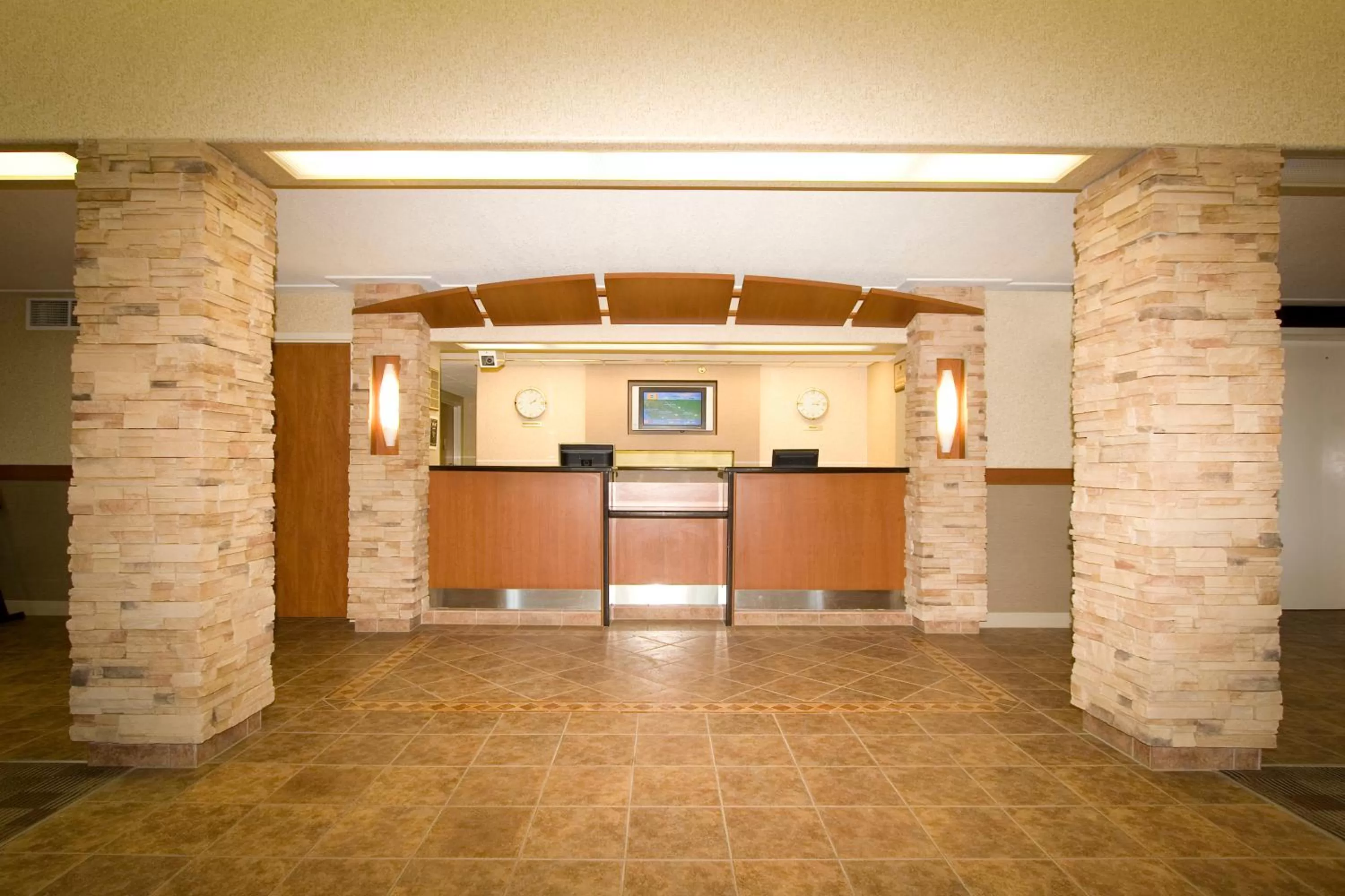 Lobby or reception in Woodlands Inn & Suites