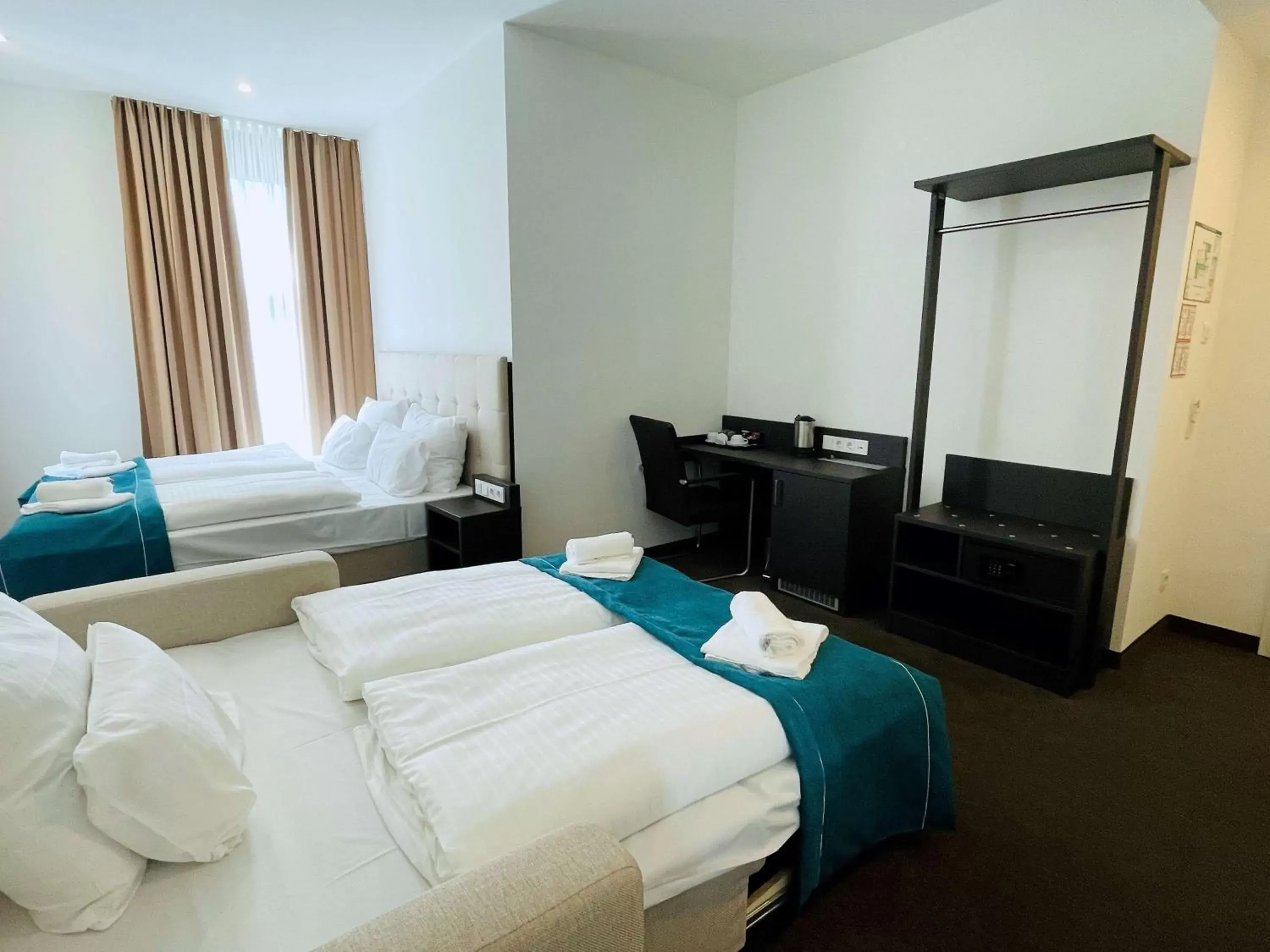 Family Room with King Bed and Sofa Bed - Balcony in The Monument Hotel - BW Signature Collection Family Room with King Bed and Sofa Bed - Balcony in The Monument Hotel - BW Signature Collection