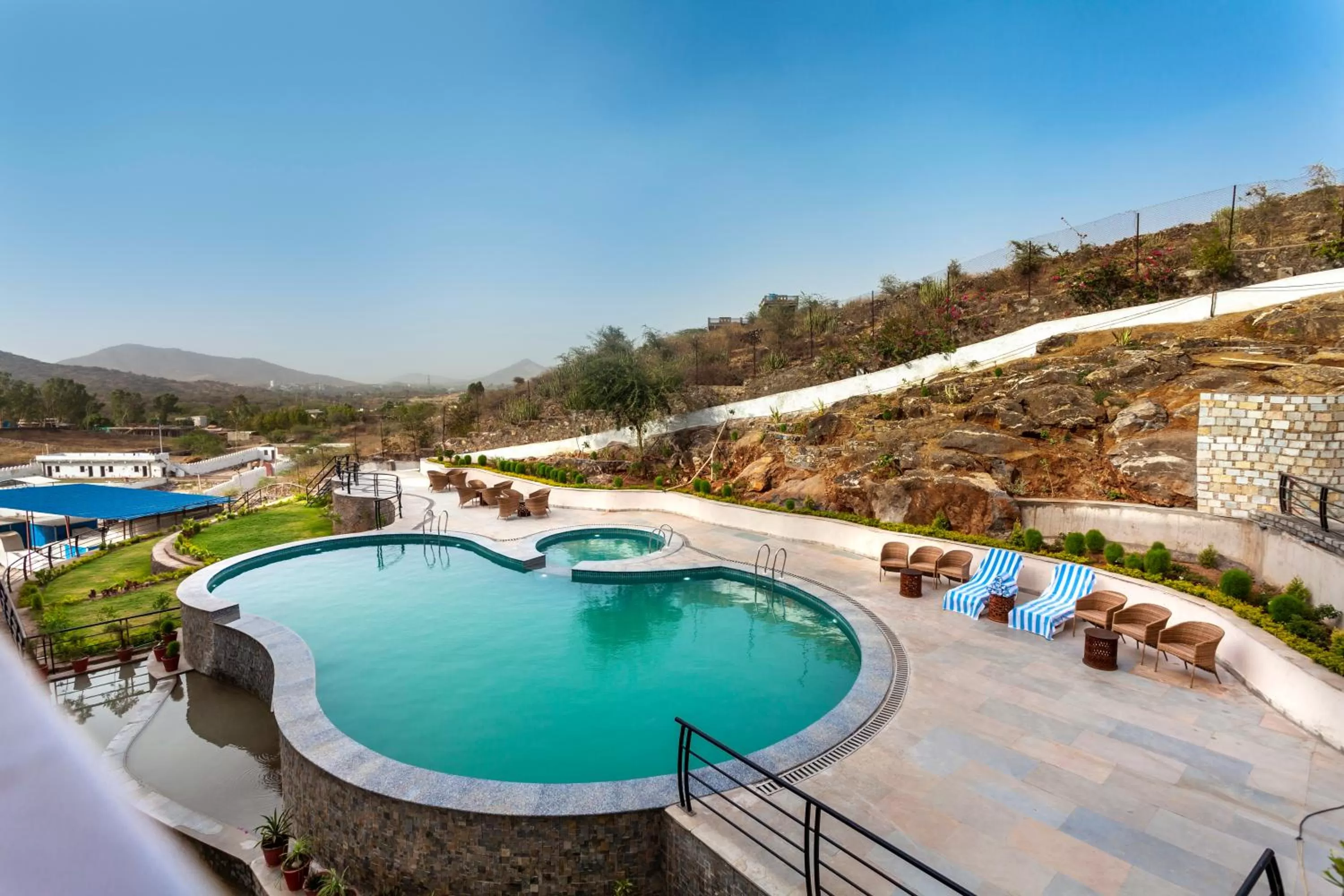 Swimming pool in jüSTa Sajjangarh Resort & Spa, Udaipur