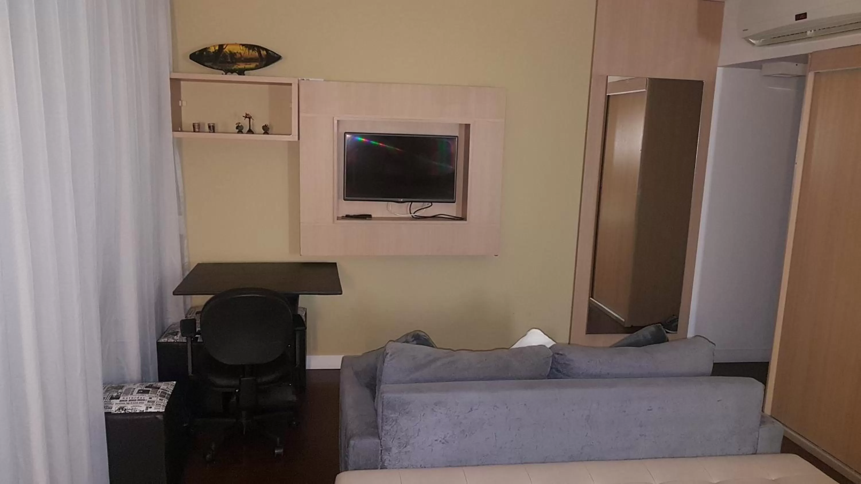 Communal lounge/ TV room in Flat Manaus