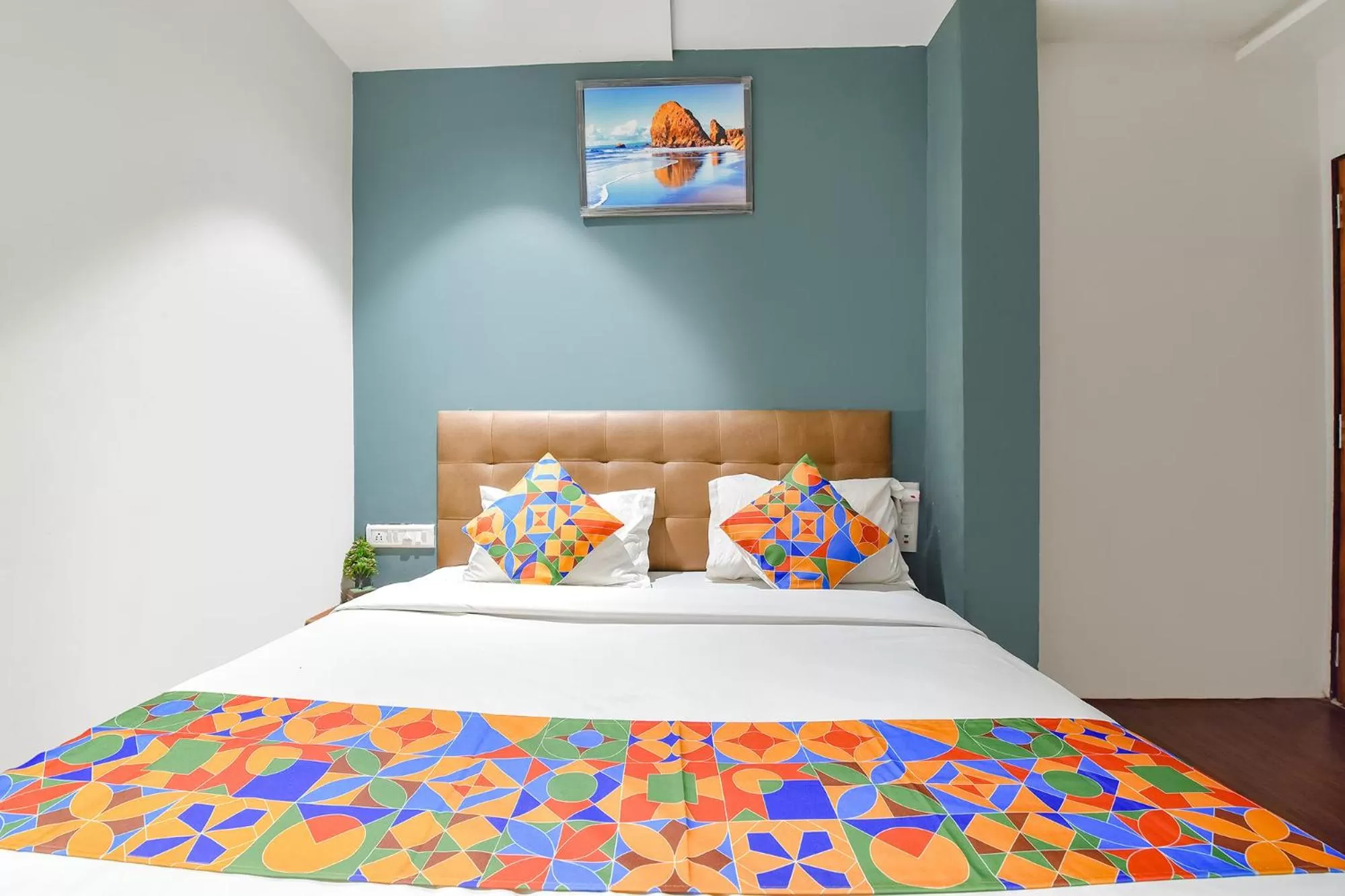 Bed in FabHotel Nidhivan, Udhna Junction