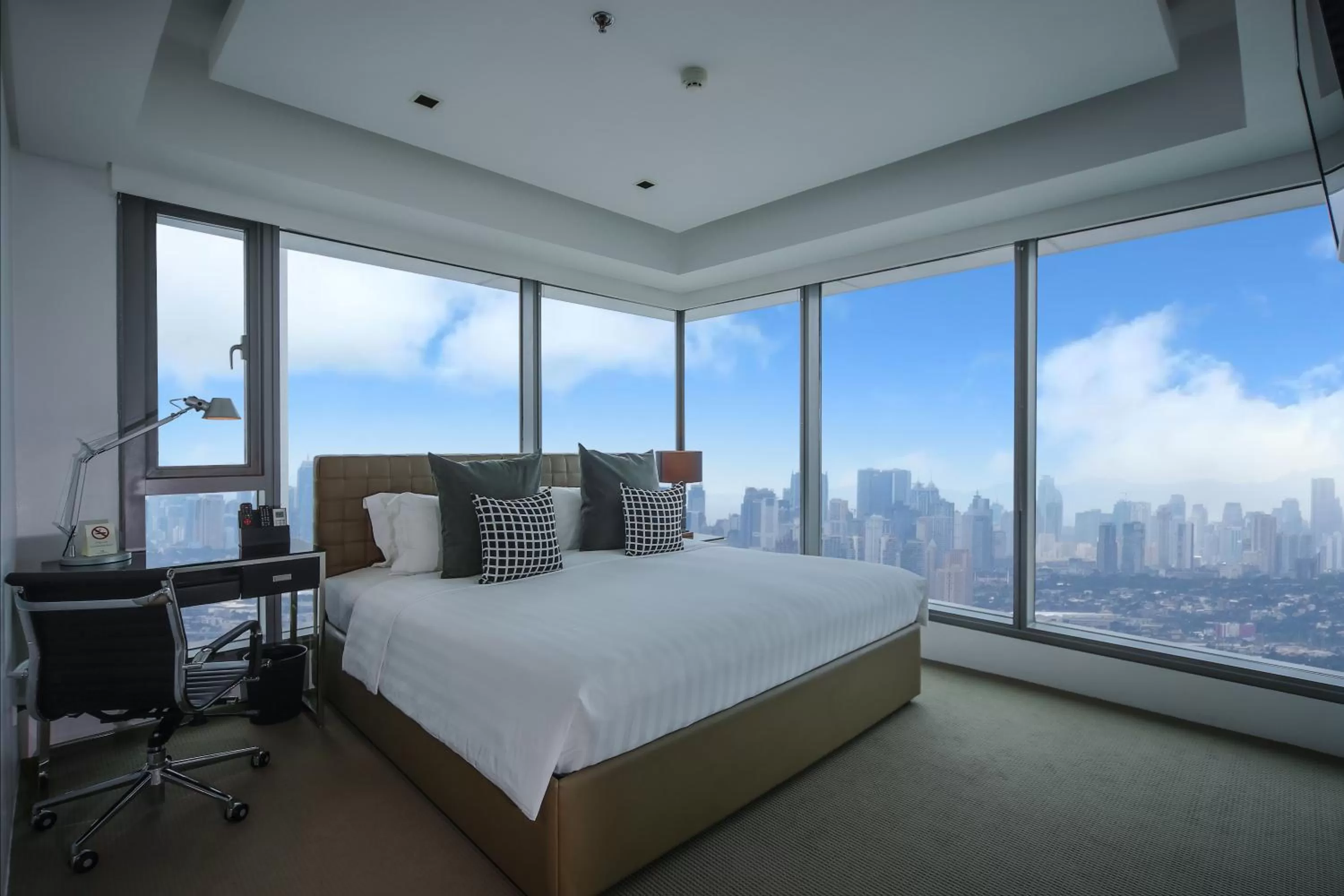 Bed in The Alpha Suites