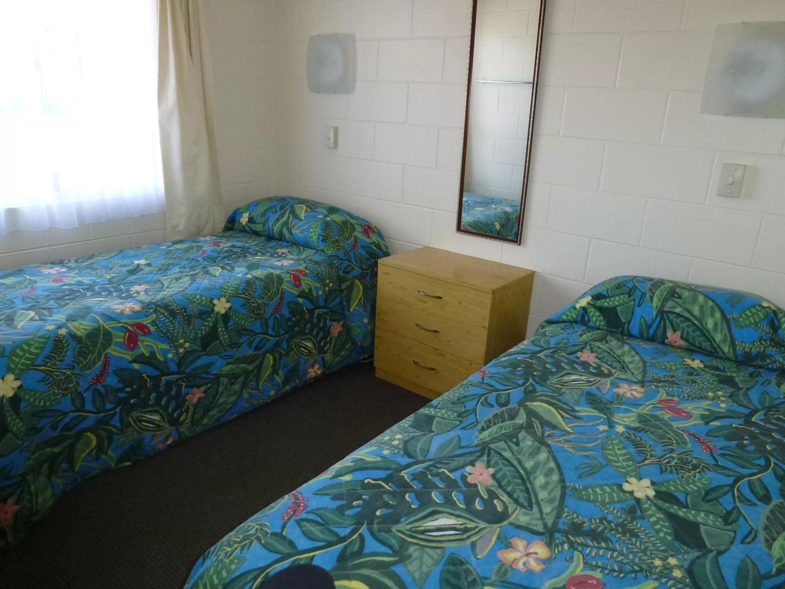 Bed in Mana-Nui Motel