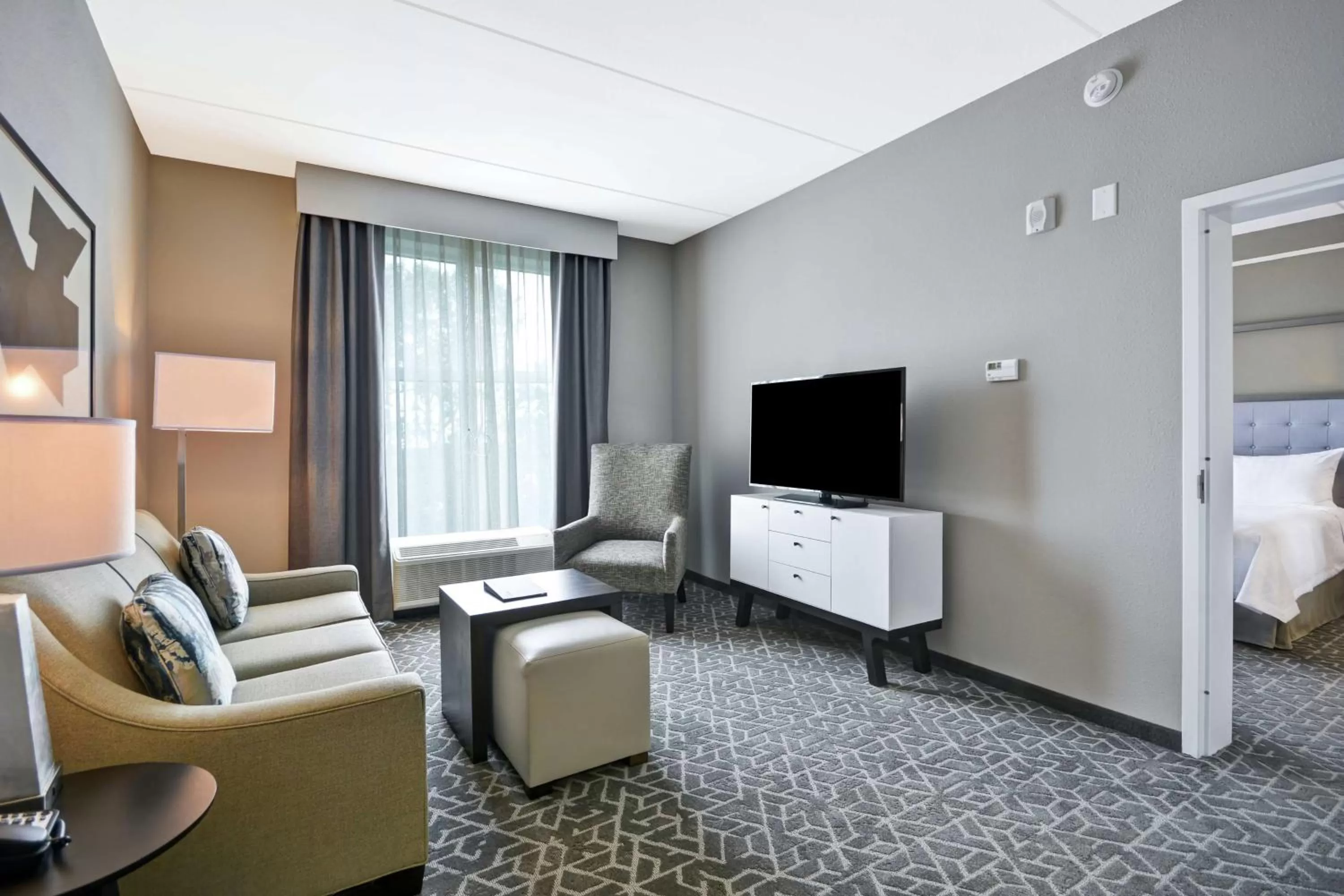 Living room, Bed in Homewood Suites by Hilton Raleigh Cary I-40