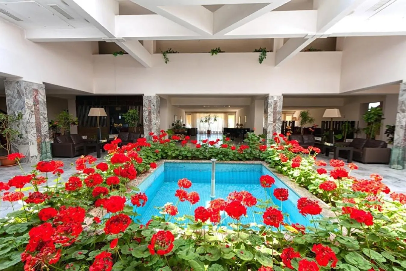 Communal lounge/ TV room in Regineh Hotel