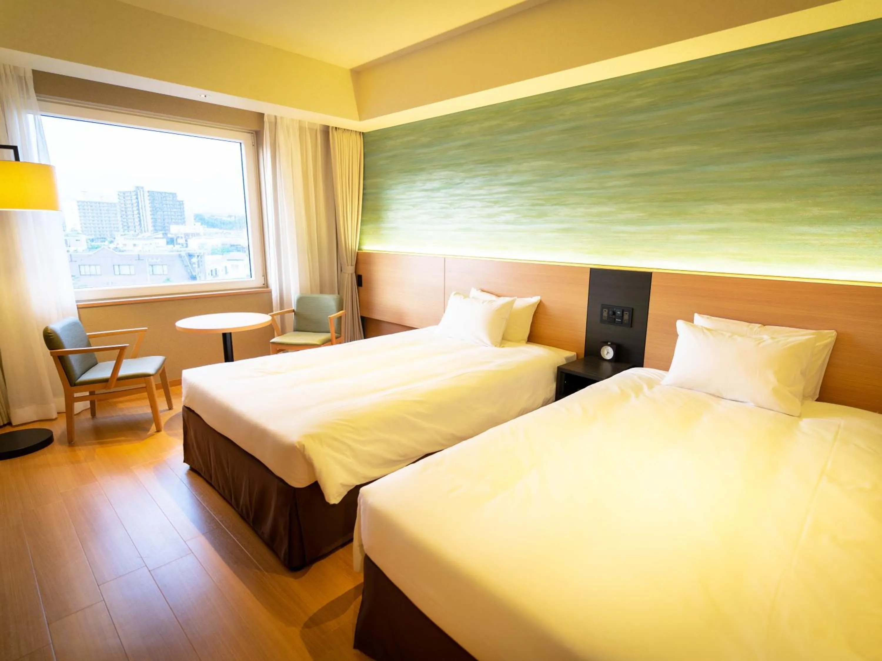 Bed in Hakodate Yunokawa Onsen Umi to Akari Hewitt Resort