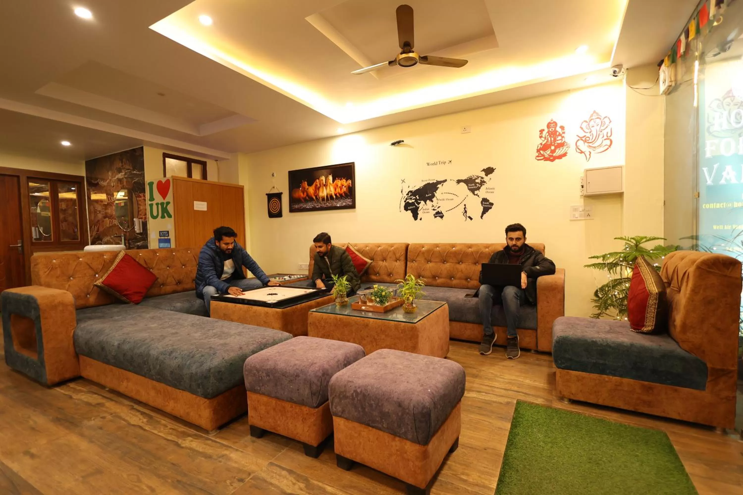 Communal lounge/ TV room in Perfectstayz Value Forest Valley Near Waterfall