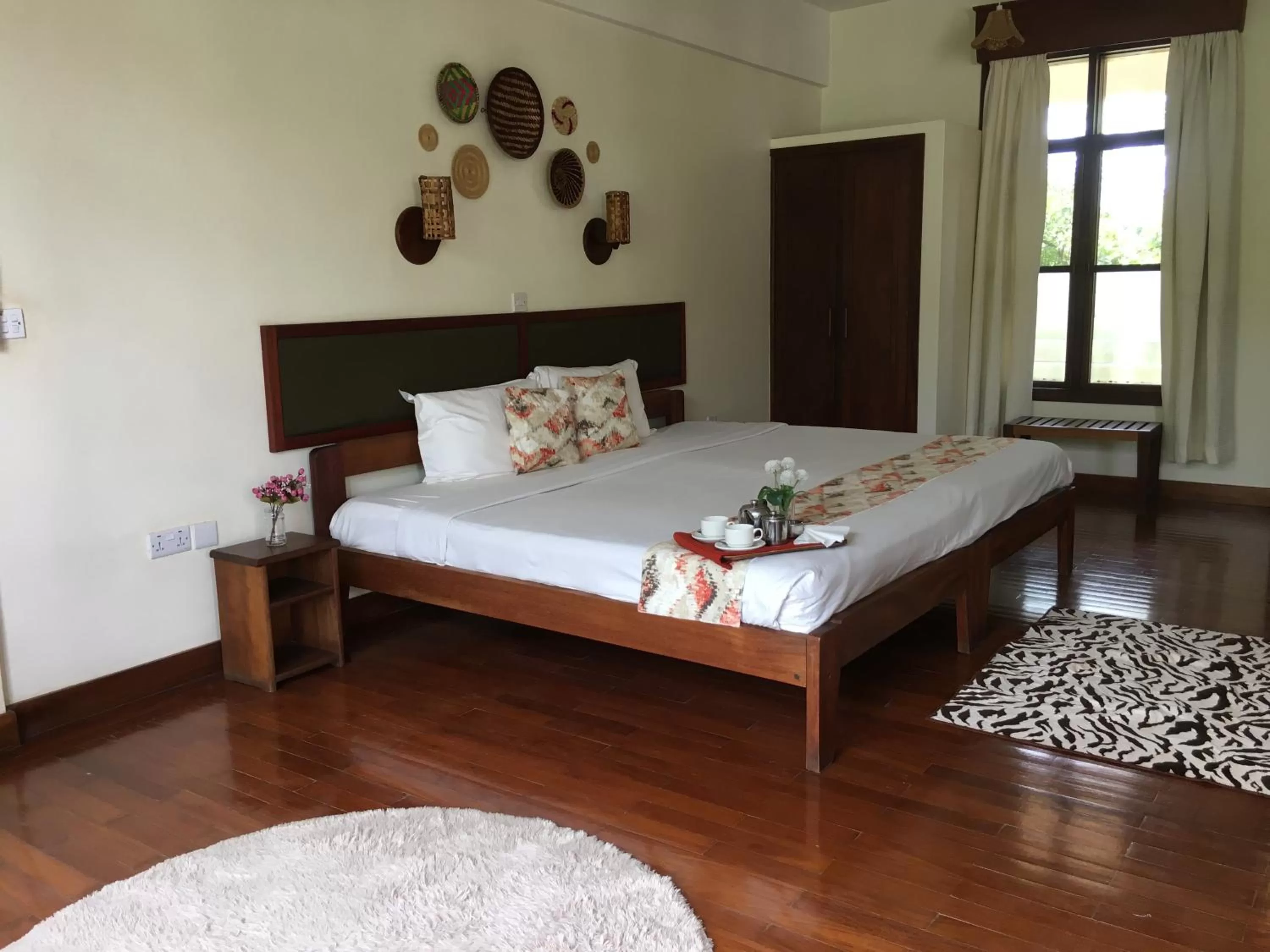 Photo of the whole room, Bed in Bristol Cottages Kilimanjaro