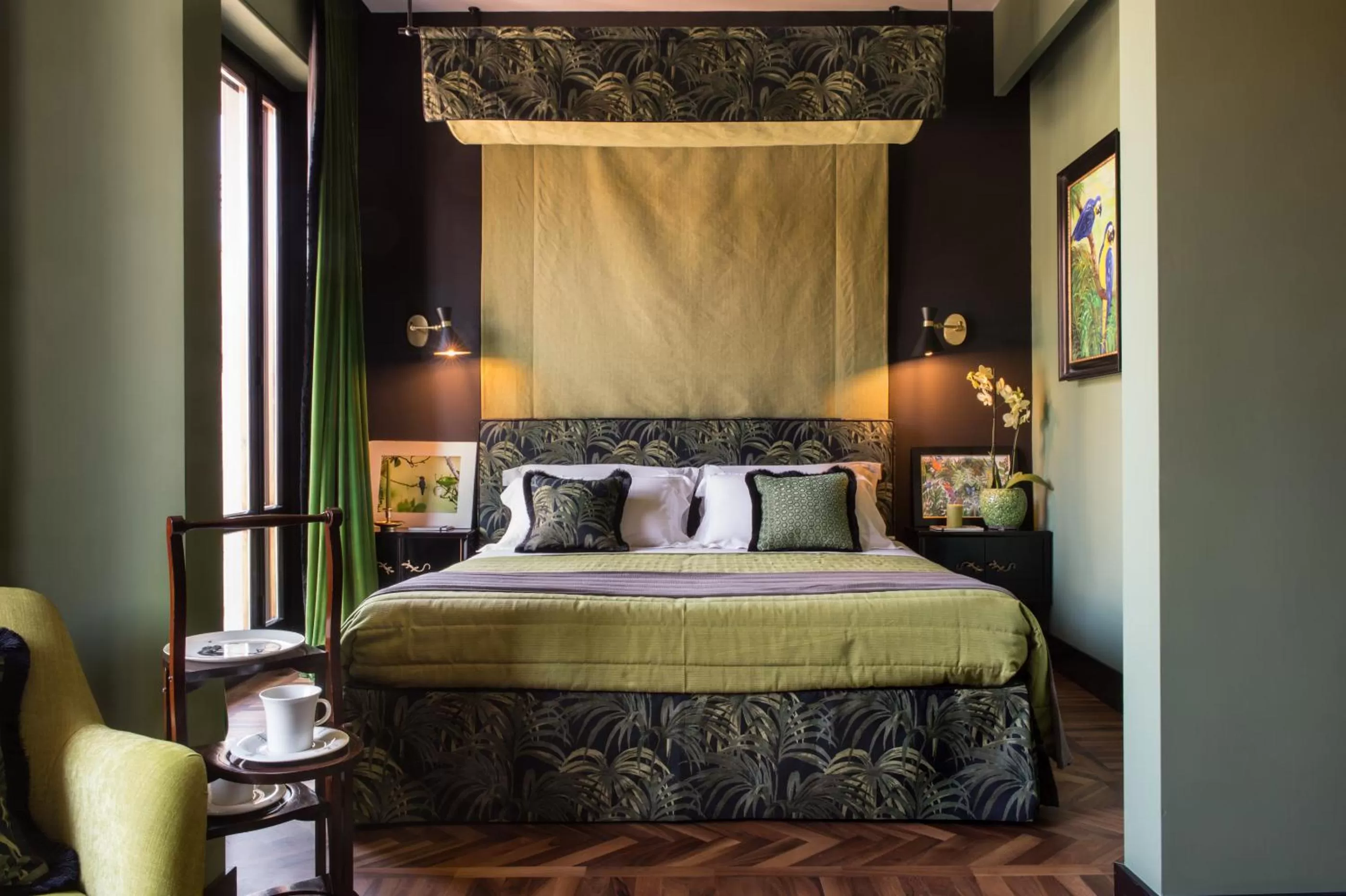 Bed in Velona's Jungle Luxury Suites