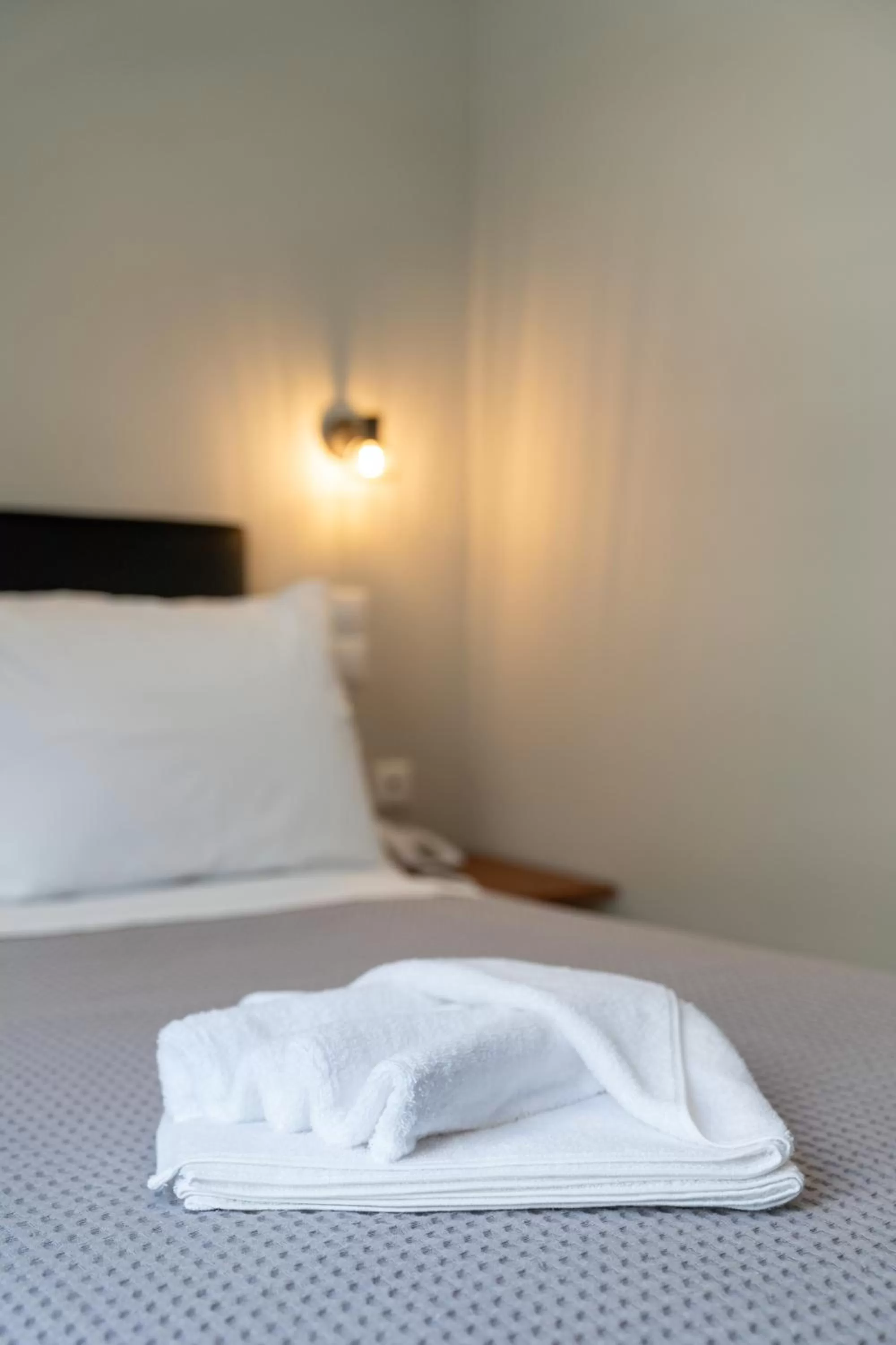 Bed in New Amaryllis Hotel