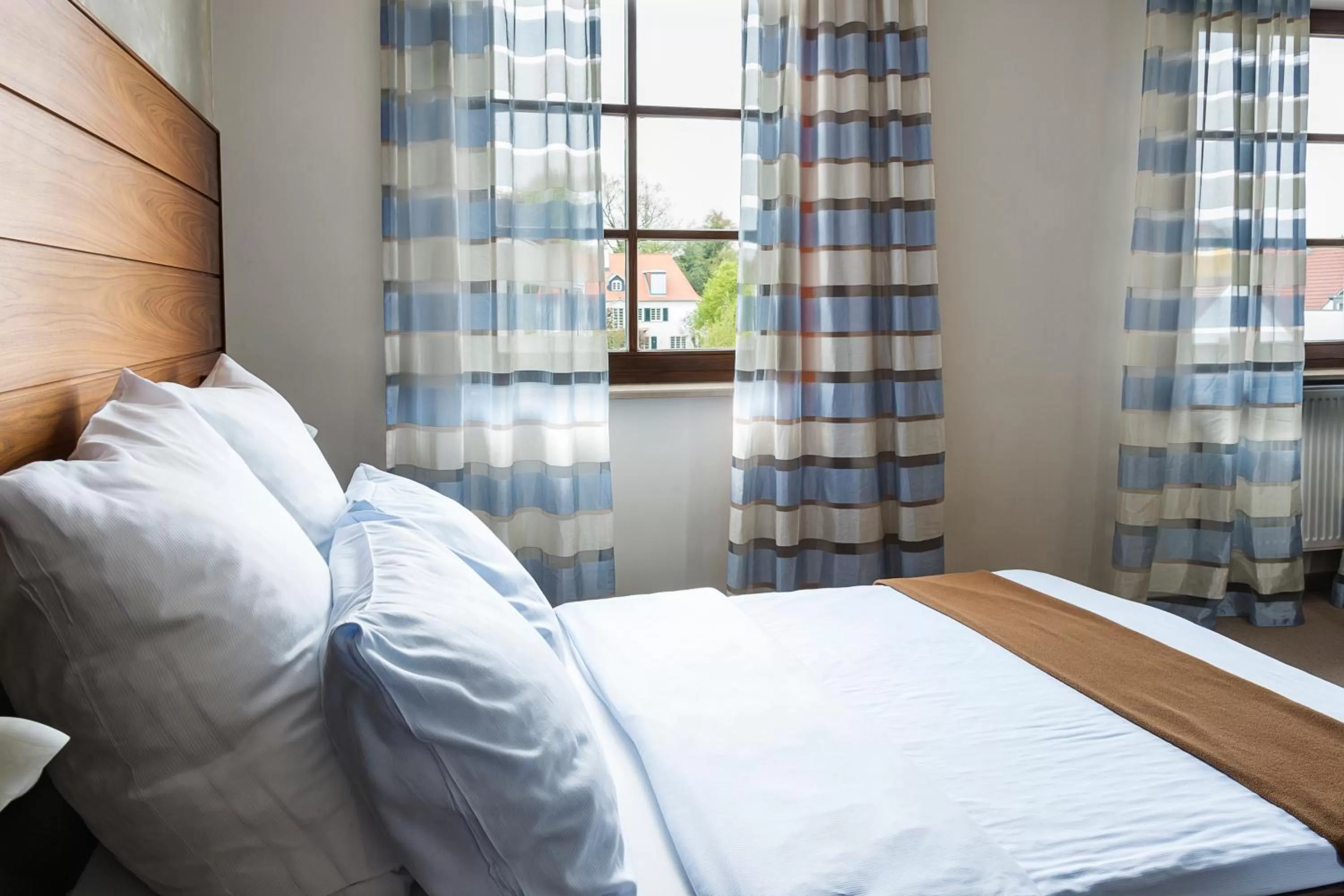 Photo of the whole room, Bed in AKZENT Hotel Laupheimer Hof