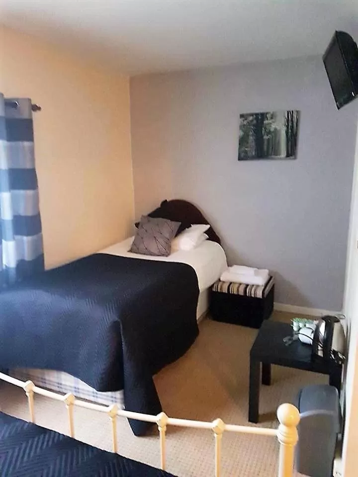 Bed in The Lamb and Flag Inn