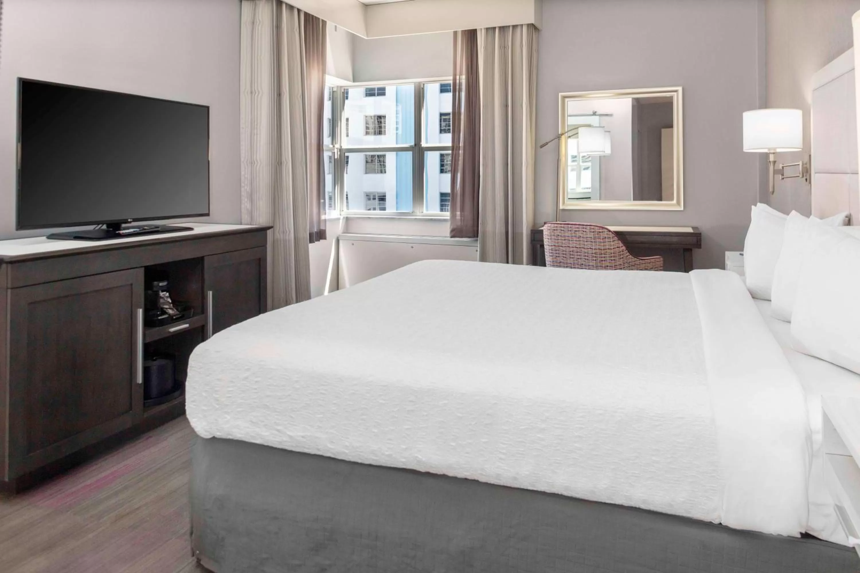 King Room with Roll in Shower - Mobility Accessible in Hotel Continental Miami Beach, Tapestry Collection by Hilton