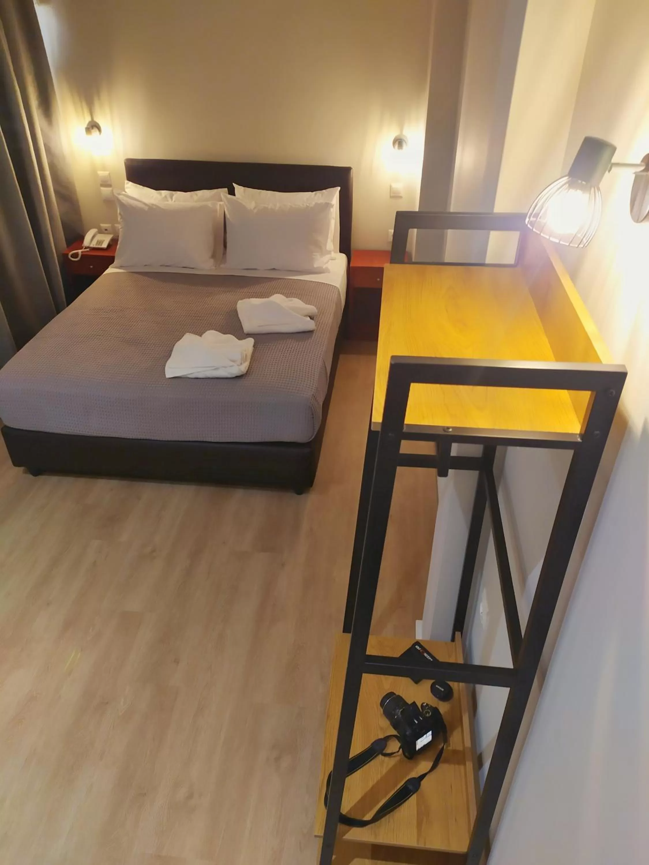 Bed in New Amaryllis Hotel