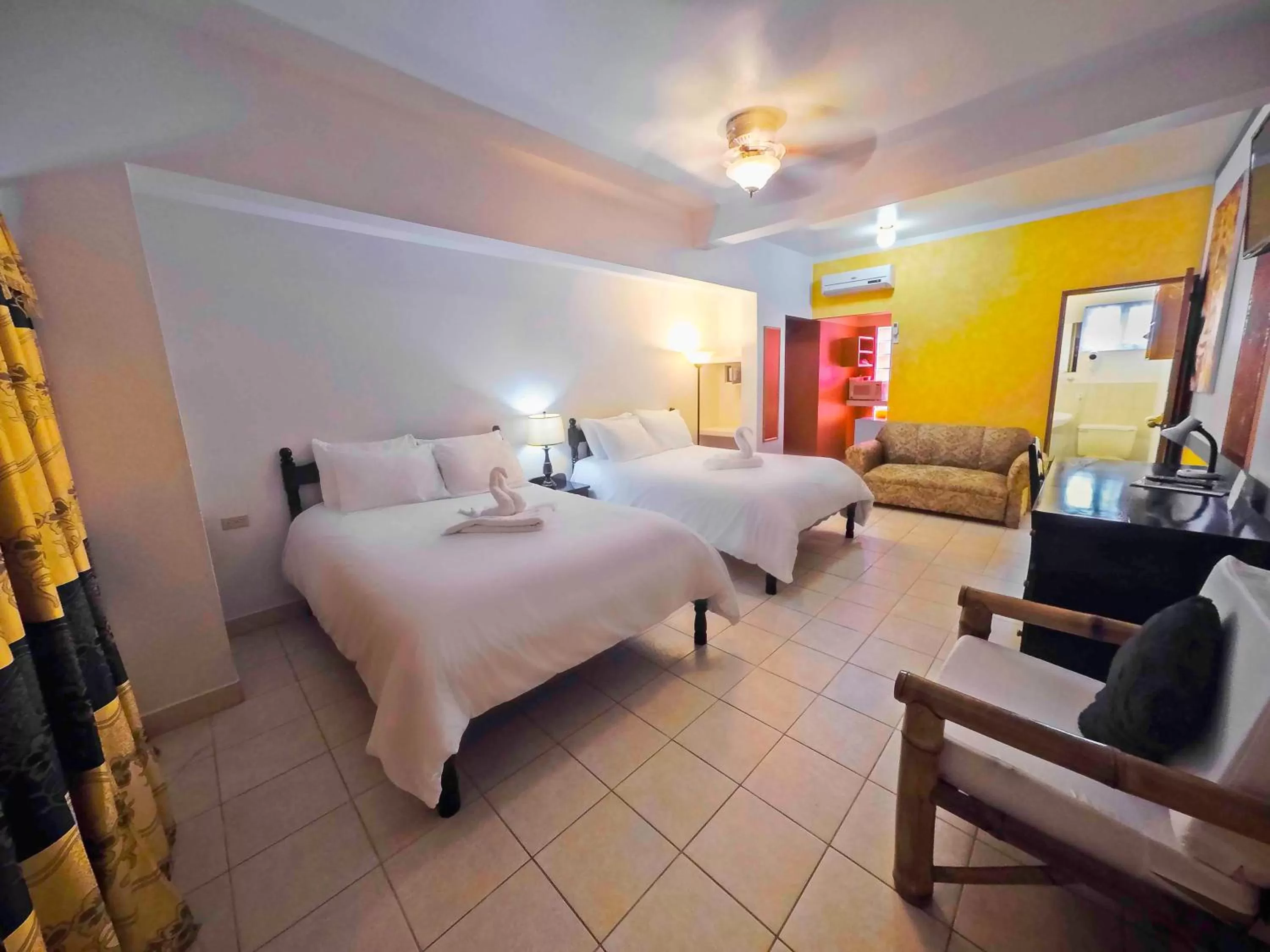 Bed in Rumors Resort Hotel