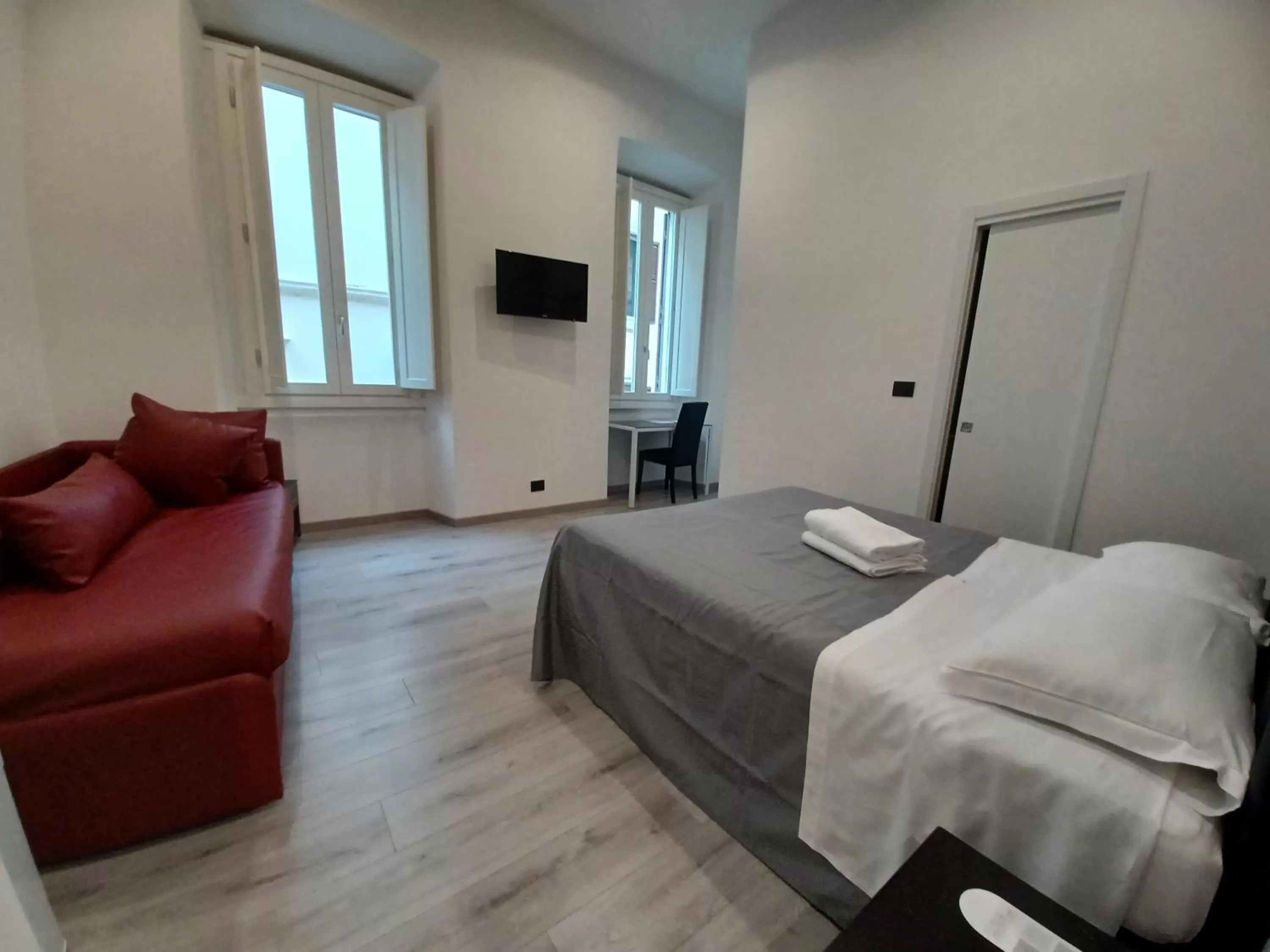 Bed in Hotel Mimosa Pantheon