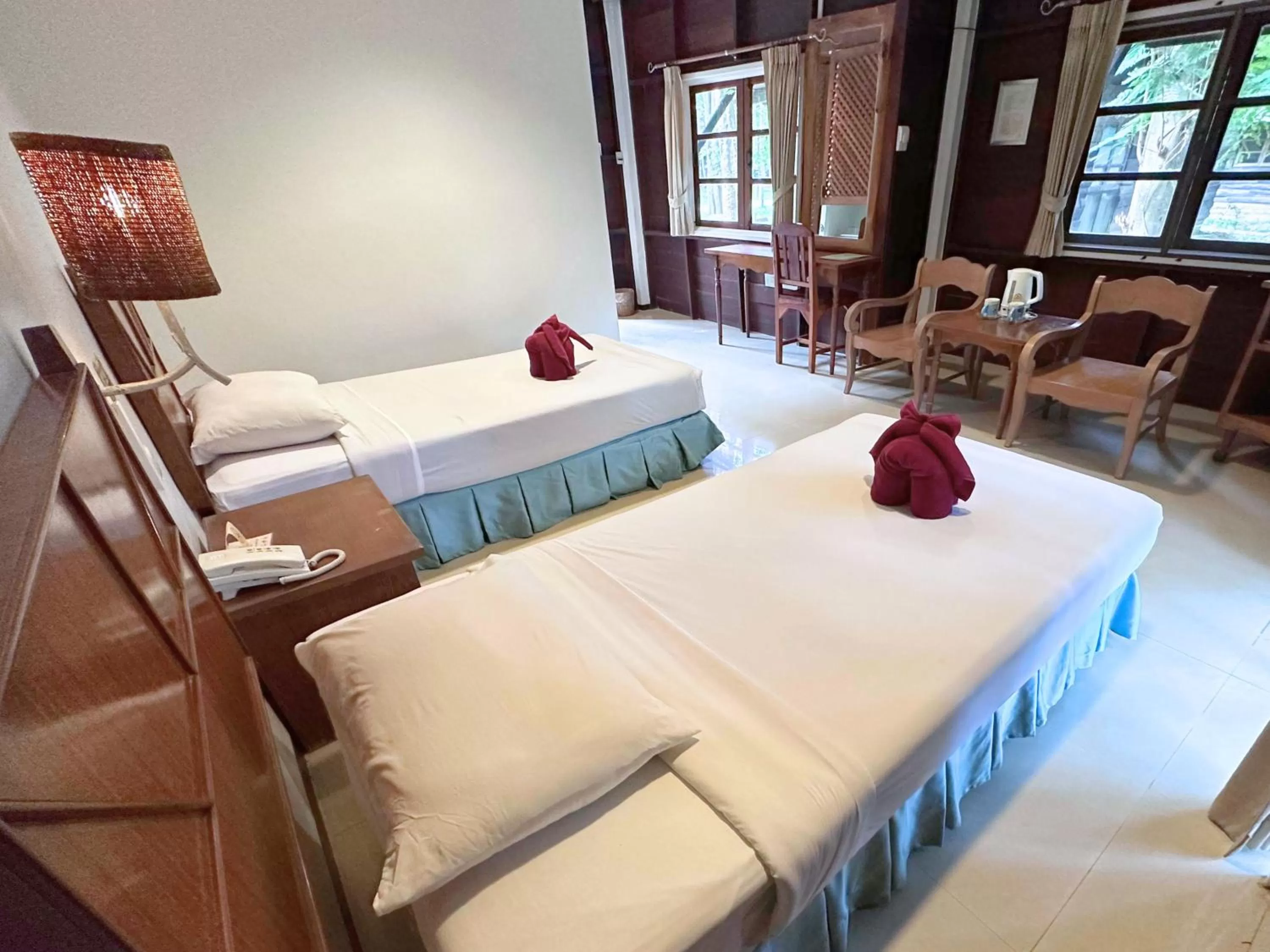 Bed in The Legacy River Kwai Resort