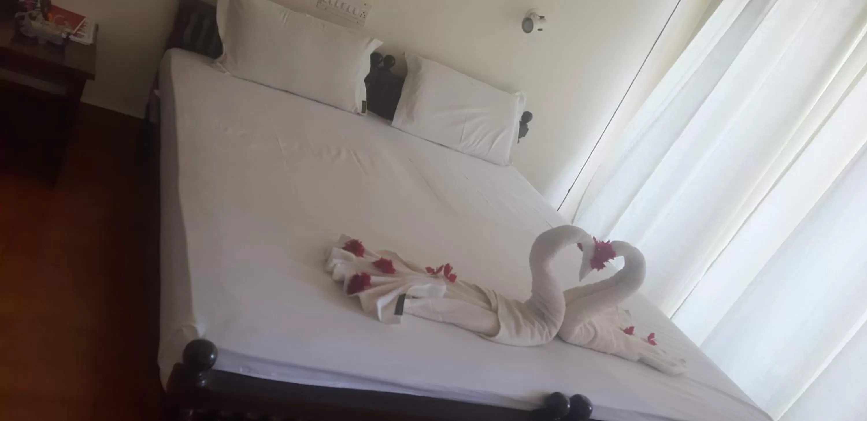 Bed in Vijaya Varma Beach Resort