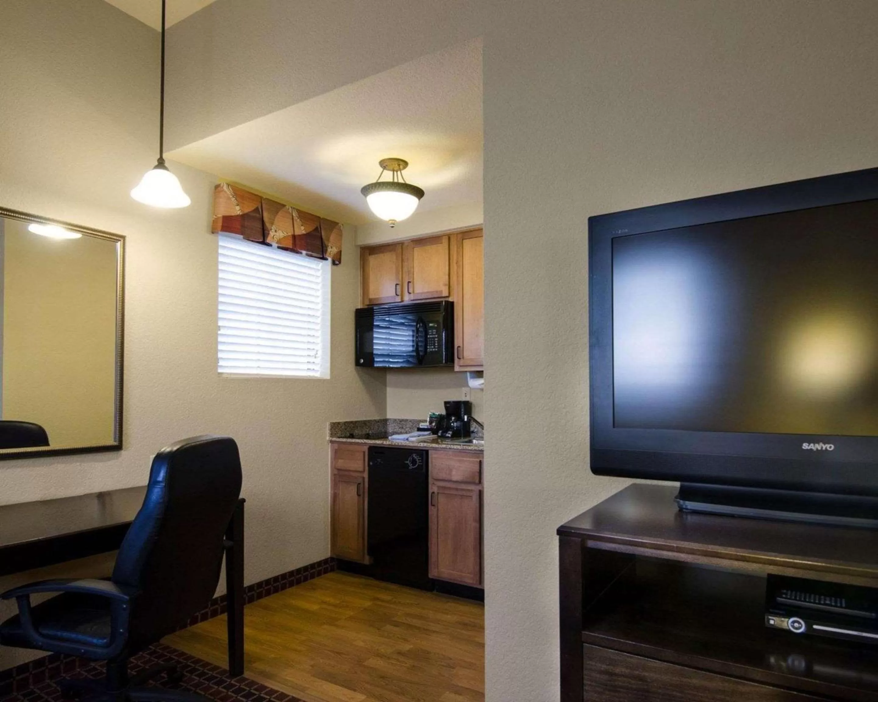 Photo of the whole room in Affordable Suites of America Rogers - Bentonville