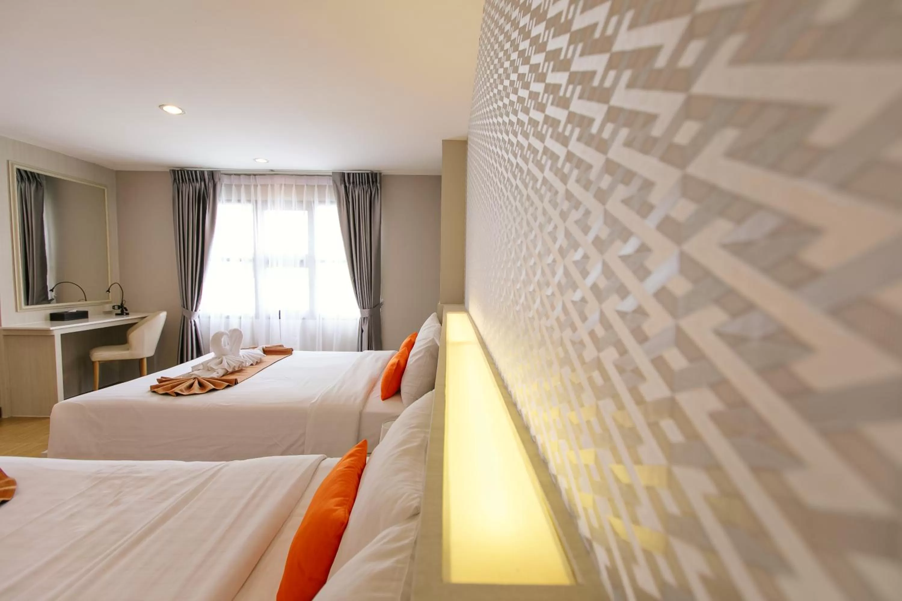 Bed in De Hug Hotel & Residence