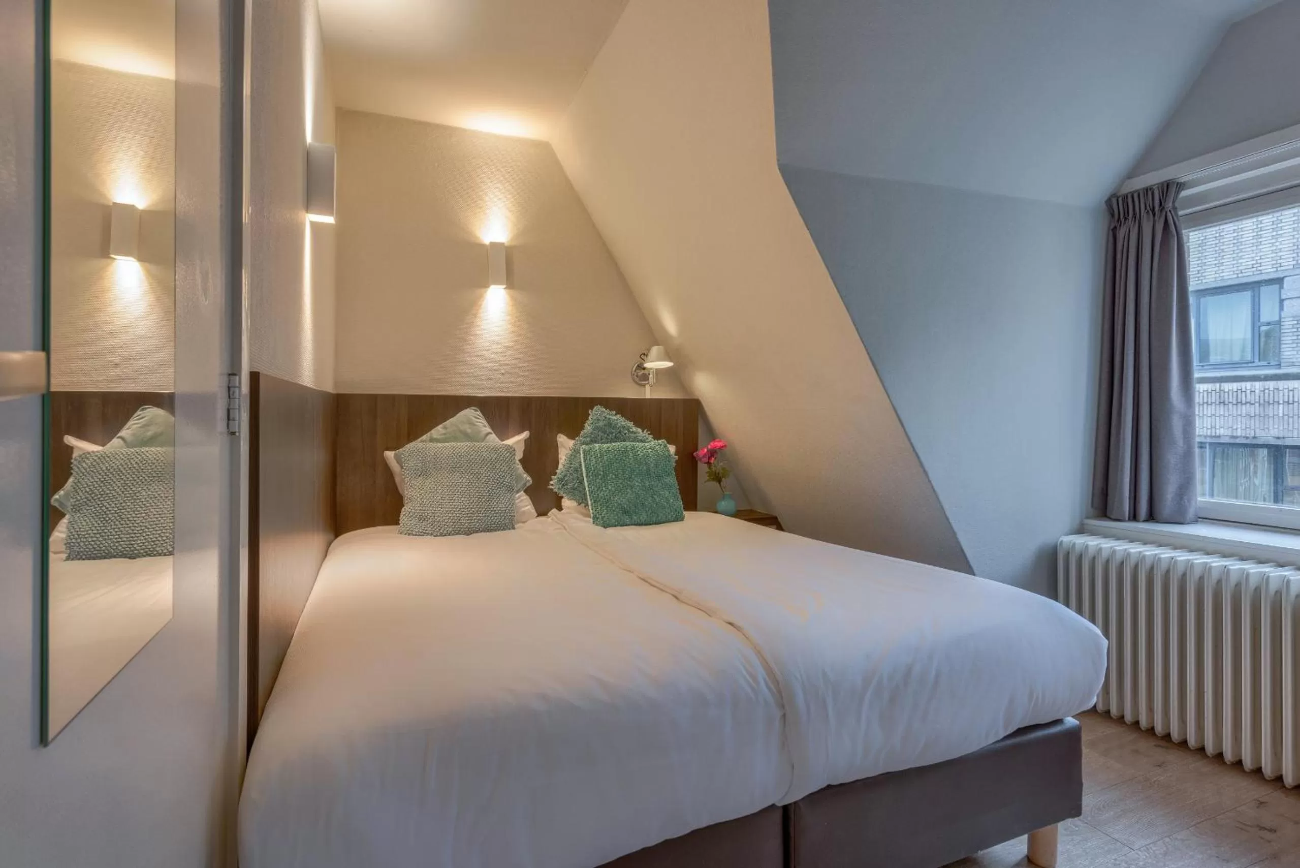 Bed in Hotel Damsquare