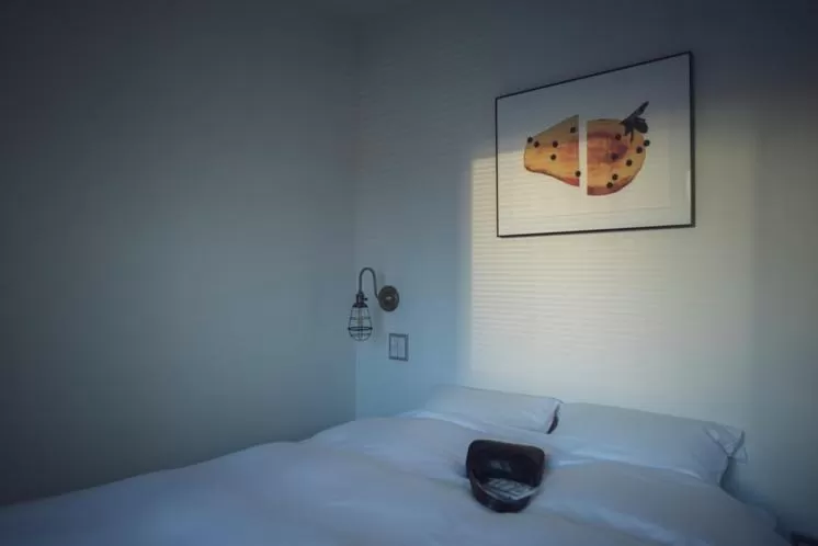 Bed in BENJAMIN HOTEL KANAZAWA