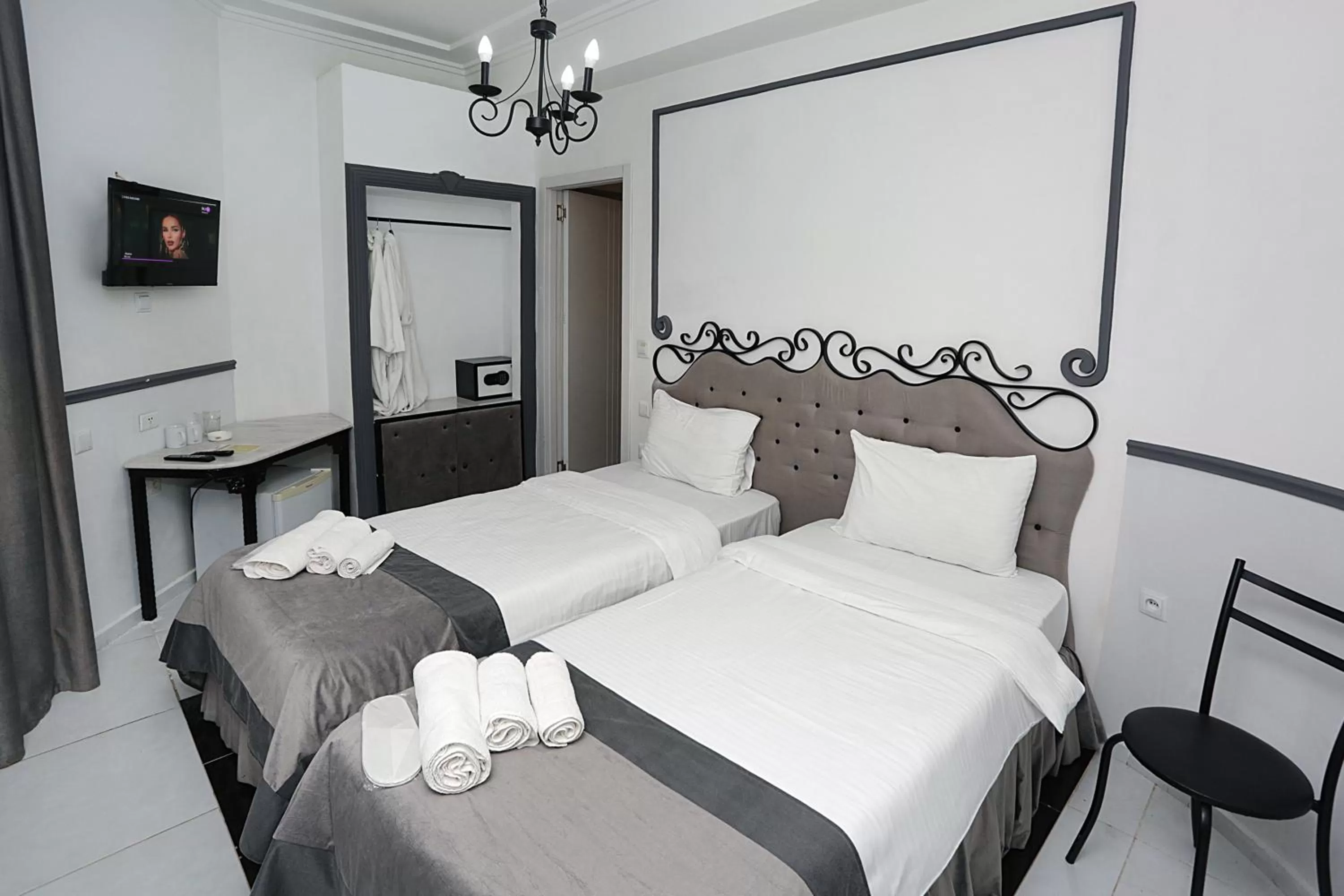 Photo of the whole room, Bed in The One Boutique