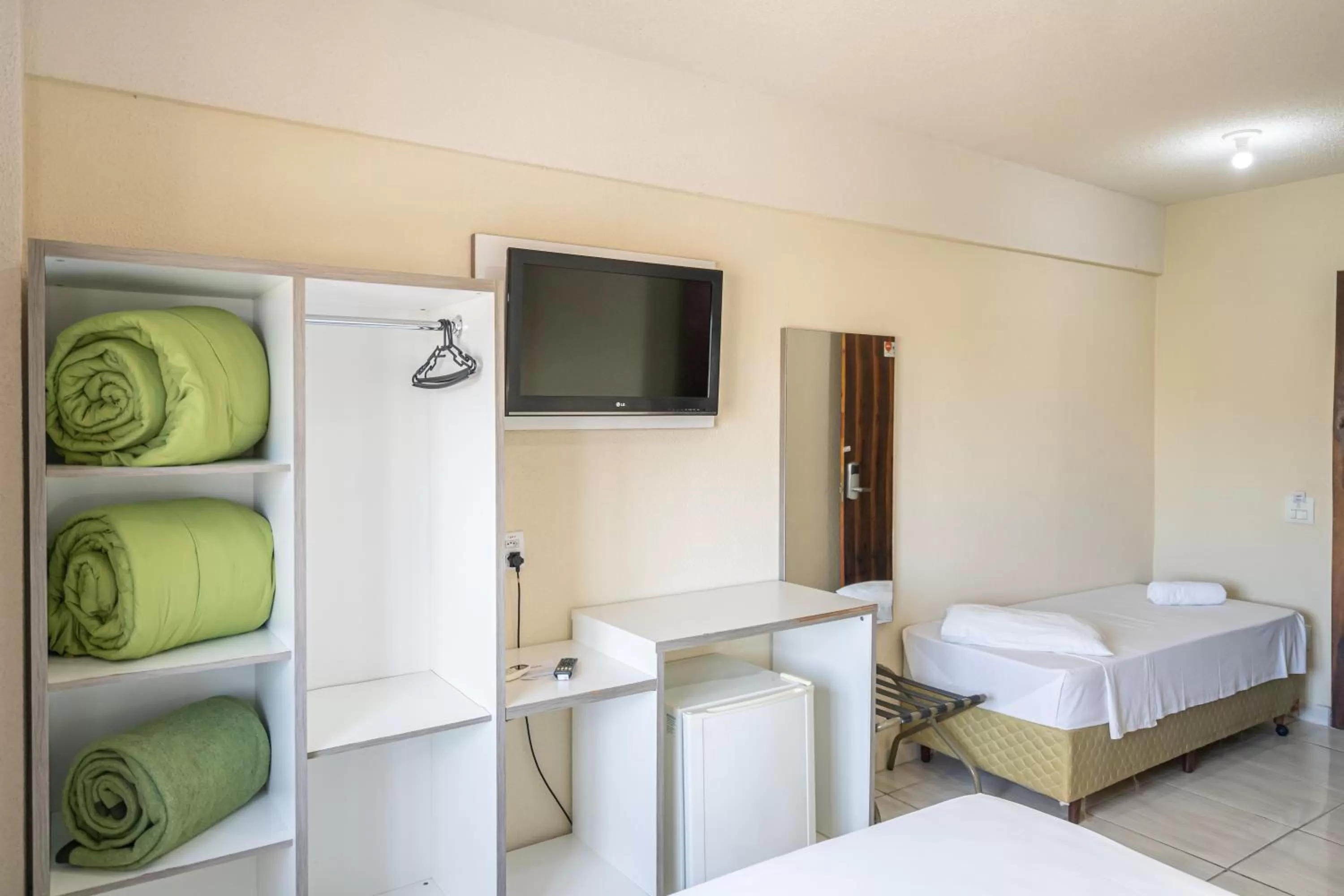 Bed in Hotel Conexão