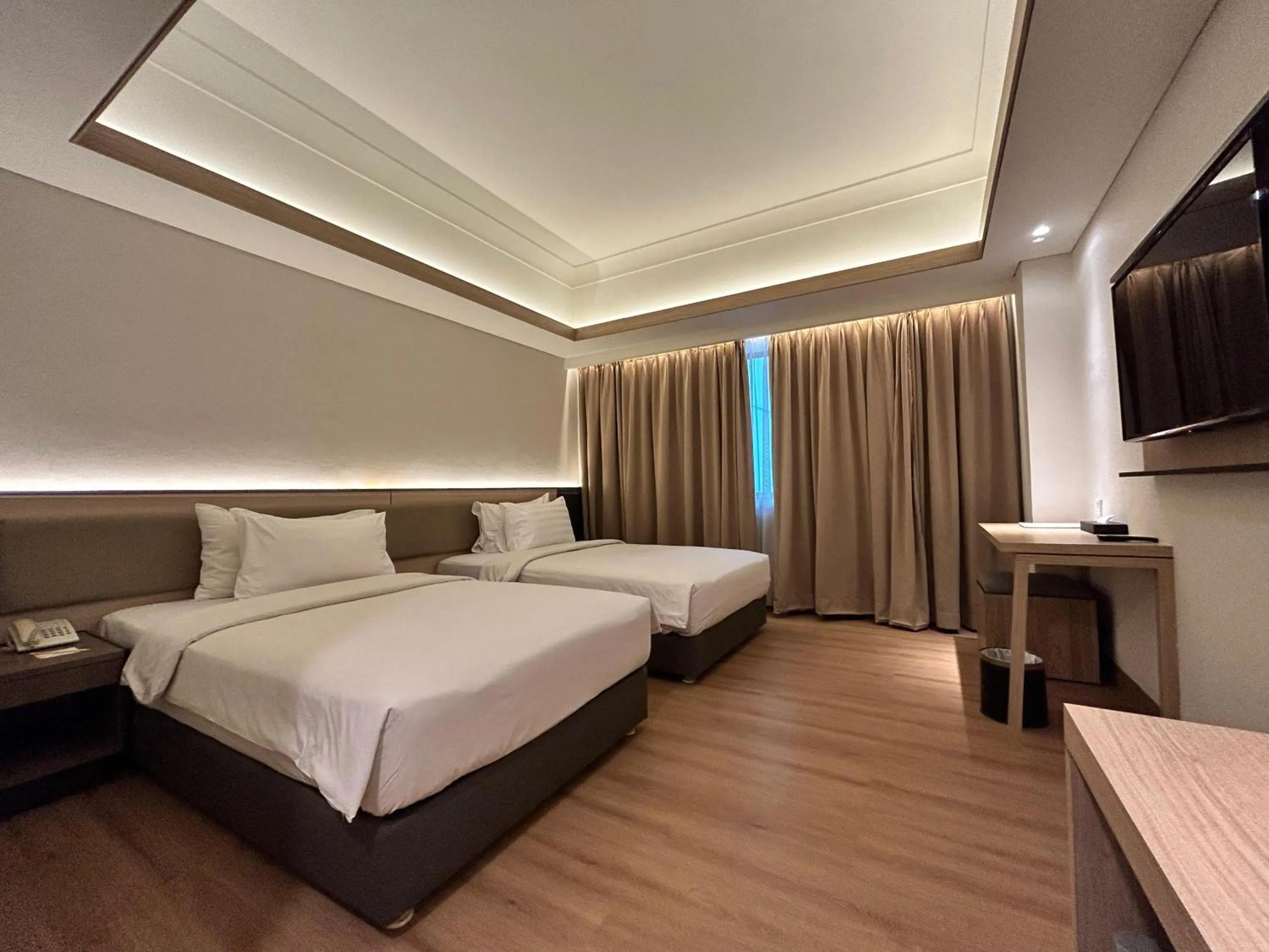Bed in Orchardz Jayakarta