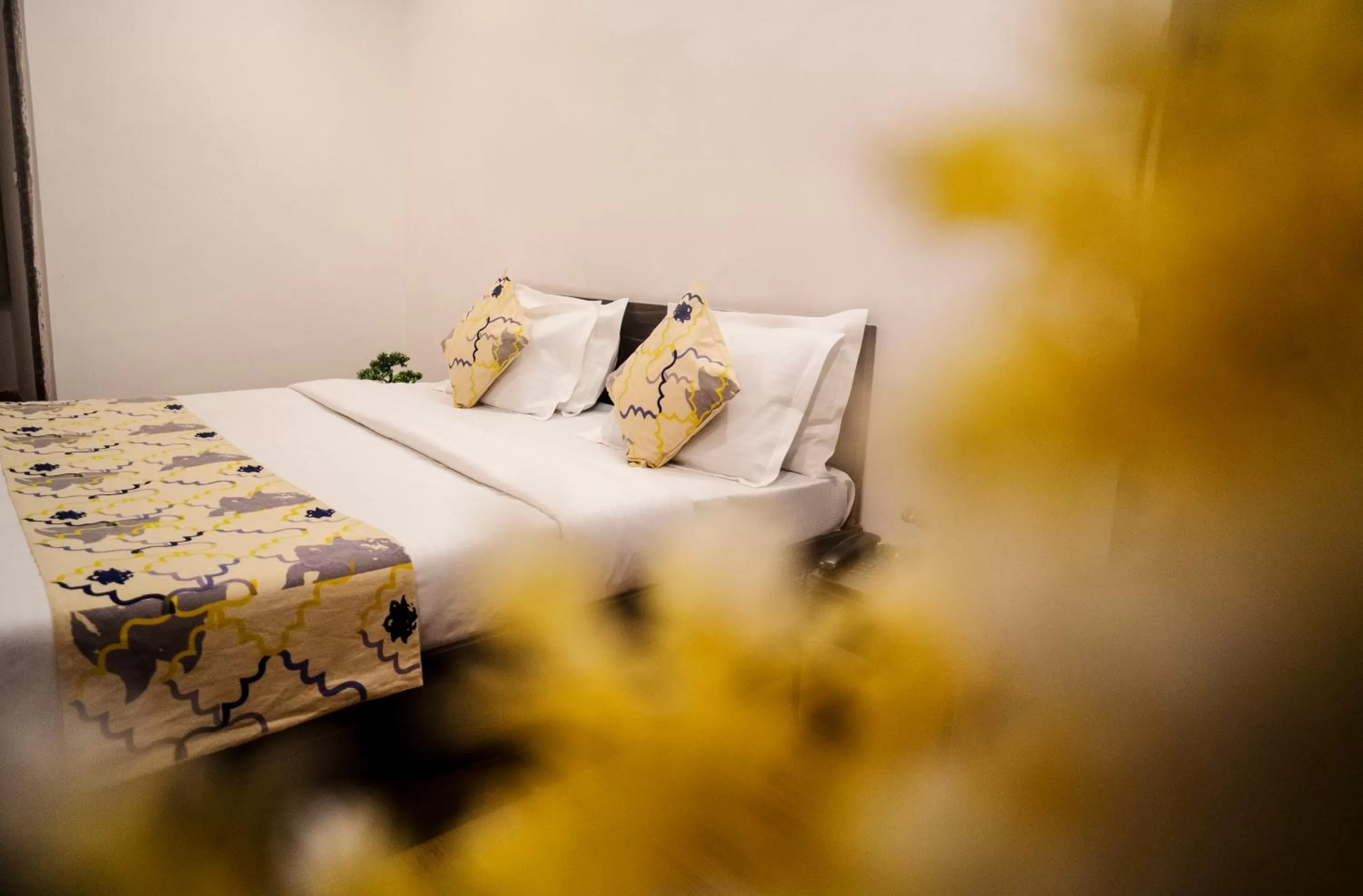 Bed in Tripli Hotels Arunoday Palace