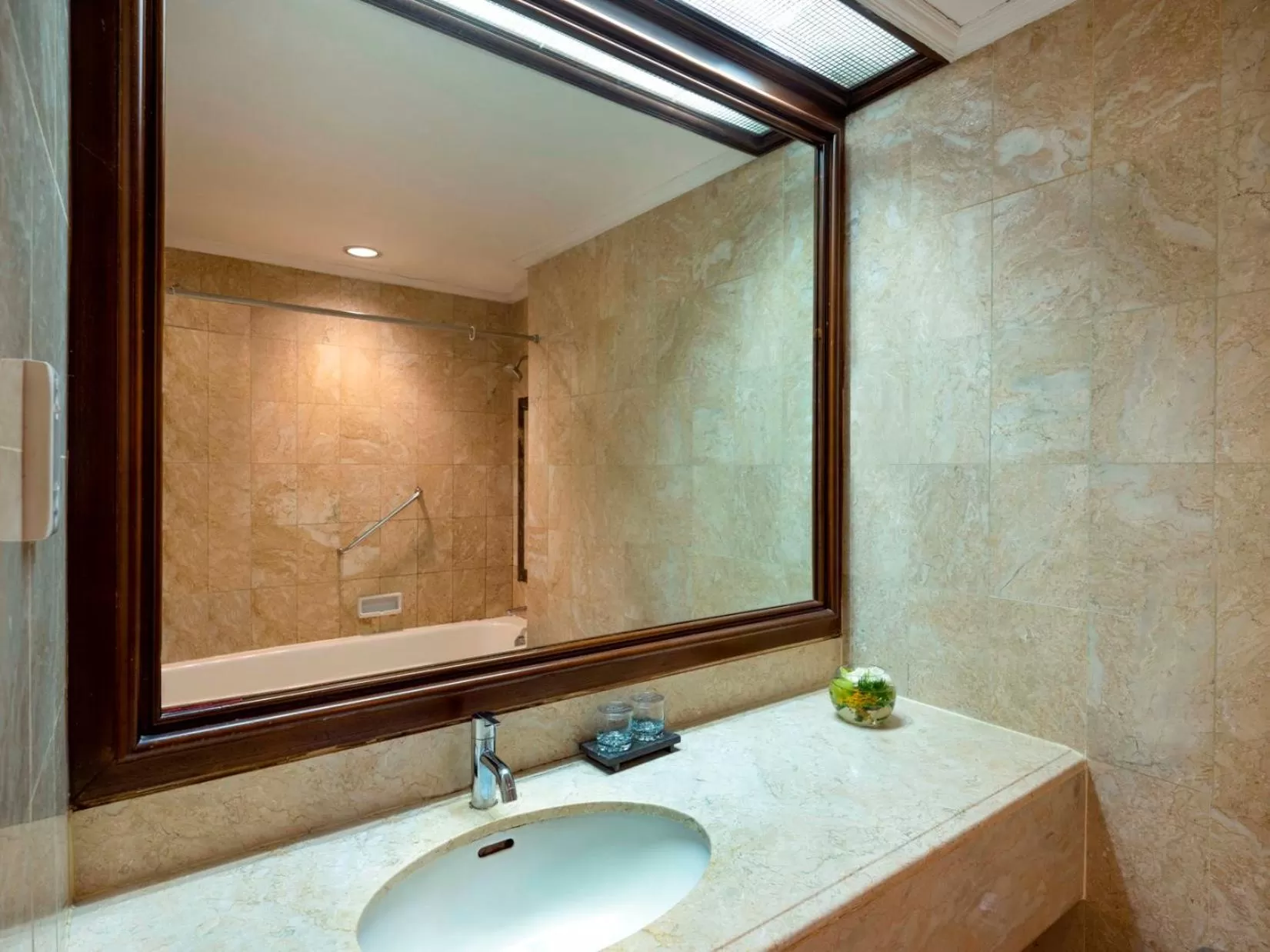 Bathroom in Hotel Ciputra Jakarta managed by Swiss-Belhotel International