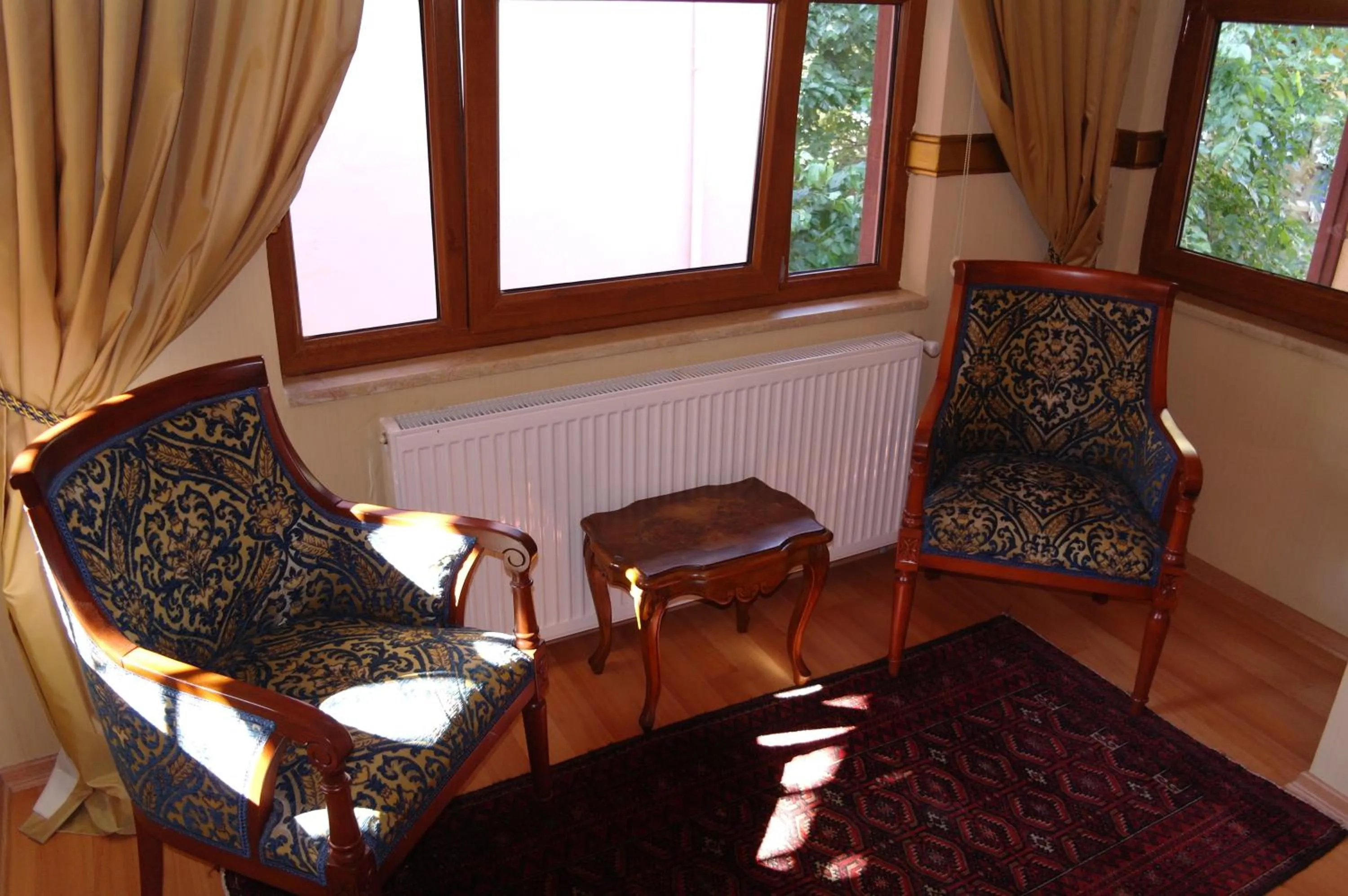 Seating area in Aruna Boutique Hotel
